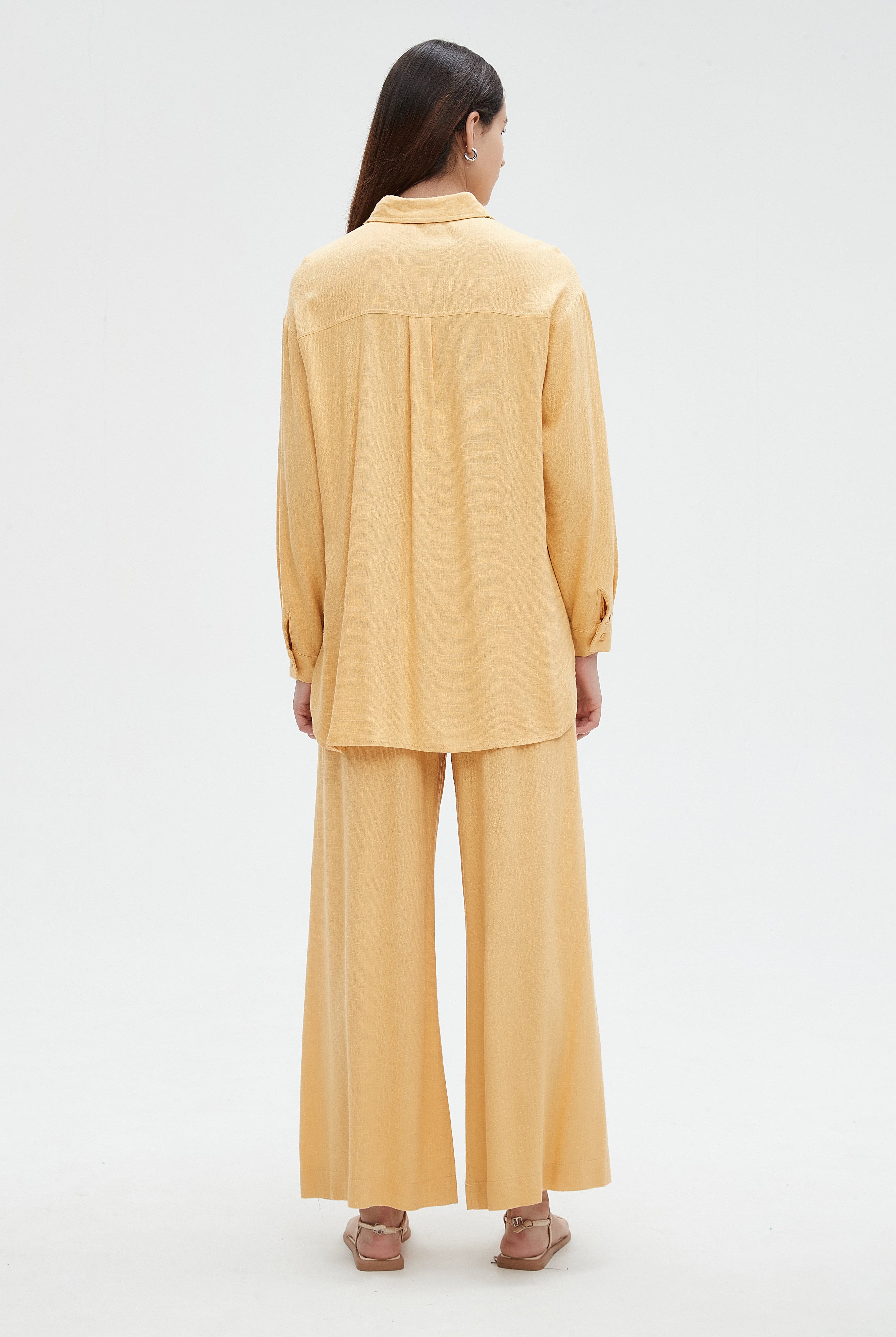 نتشي بلوزة نسائي سادة بازرار واكمام طويلة