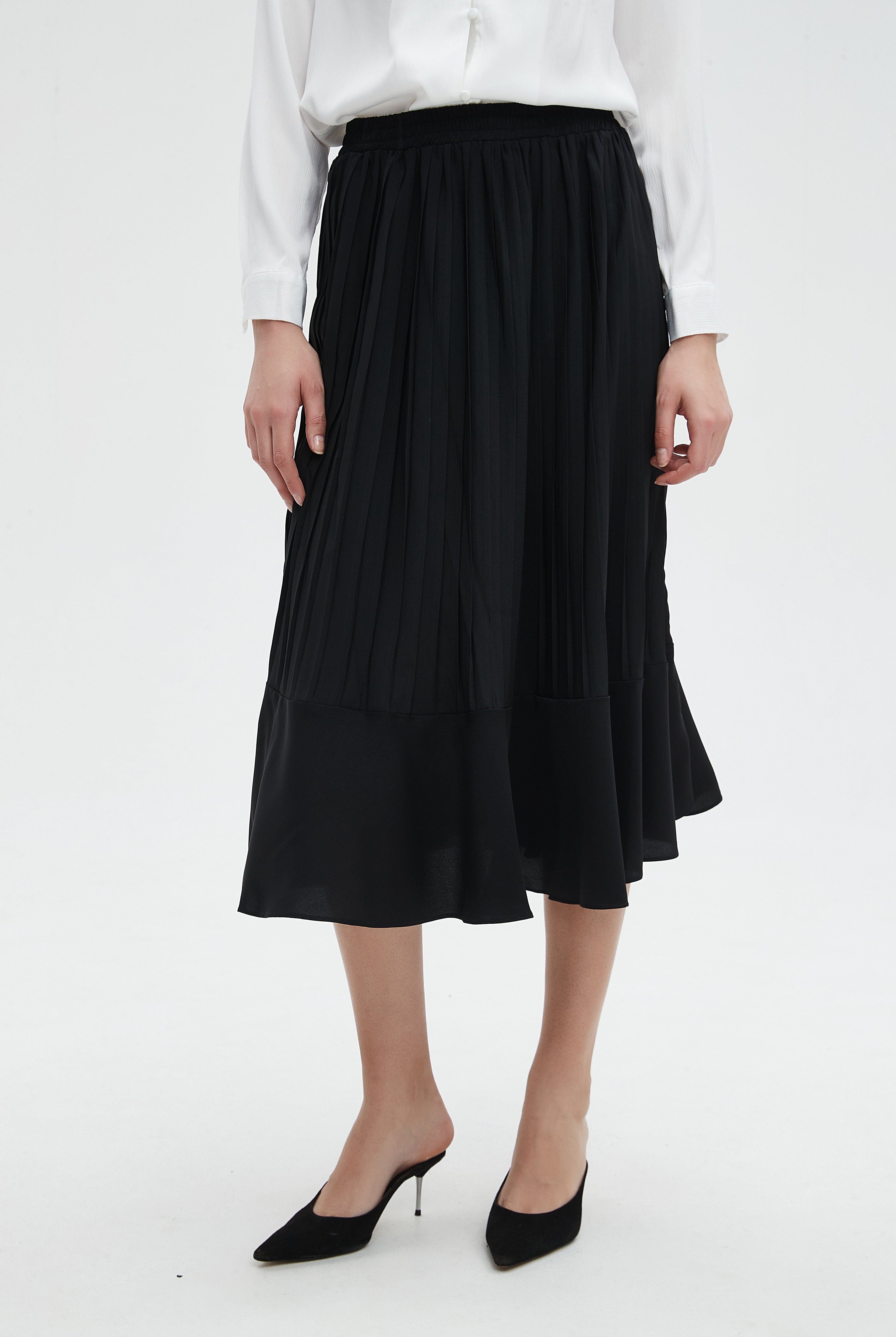 نتشي تنورة نسائية ميدي سادة بقصة كشكش رسمية