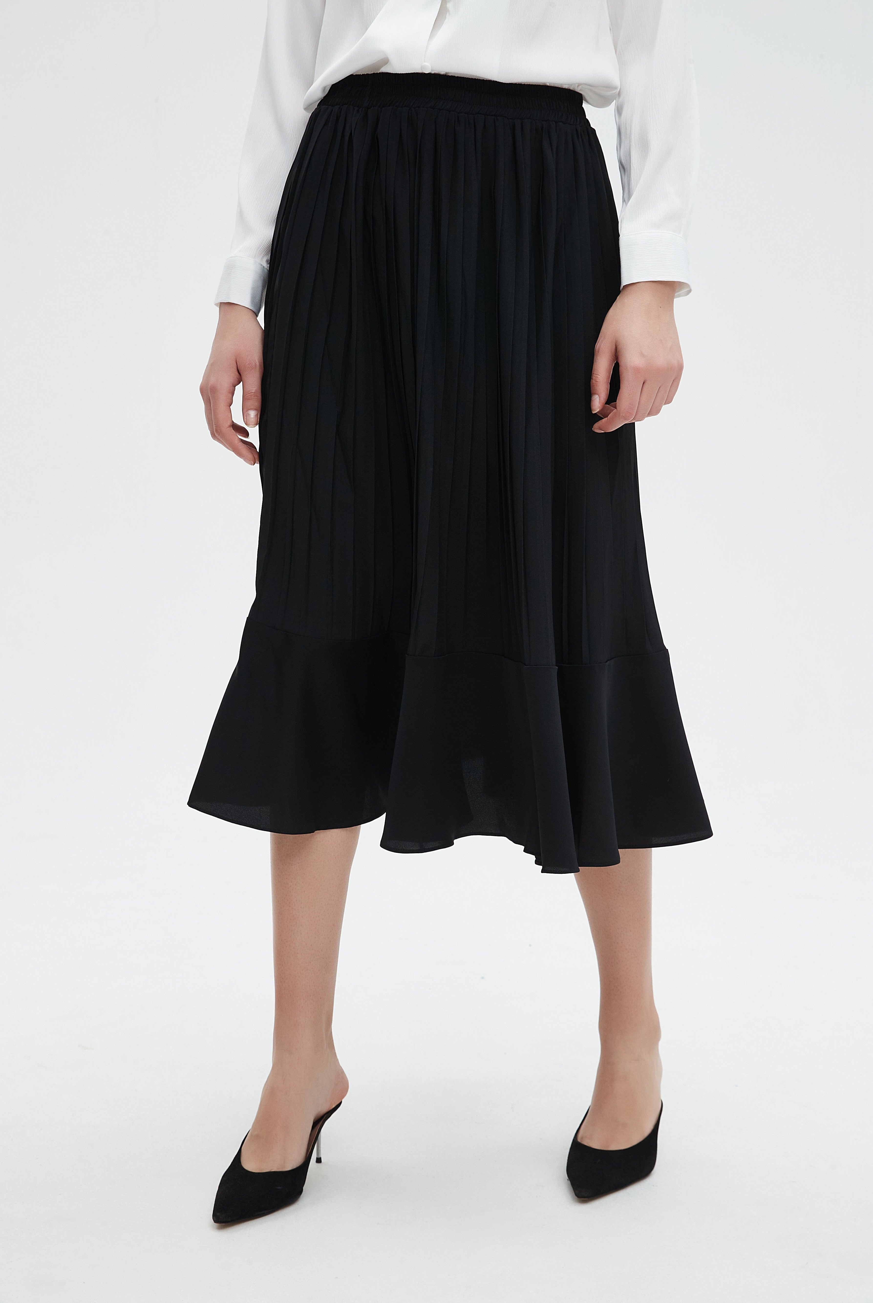 نتشي تنورة نسائية ميدي سادة بقصة كشكش رسمية