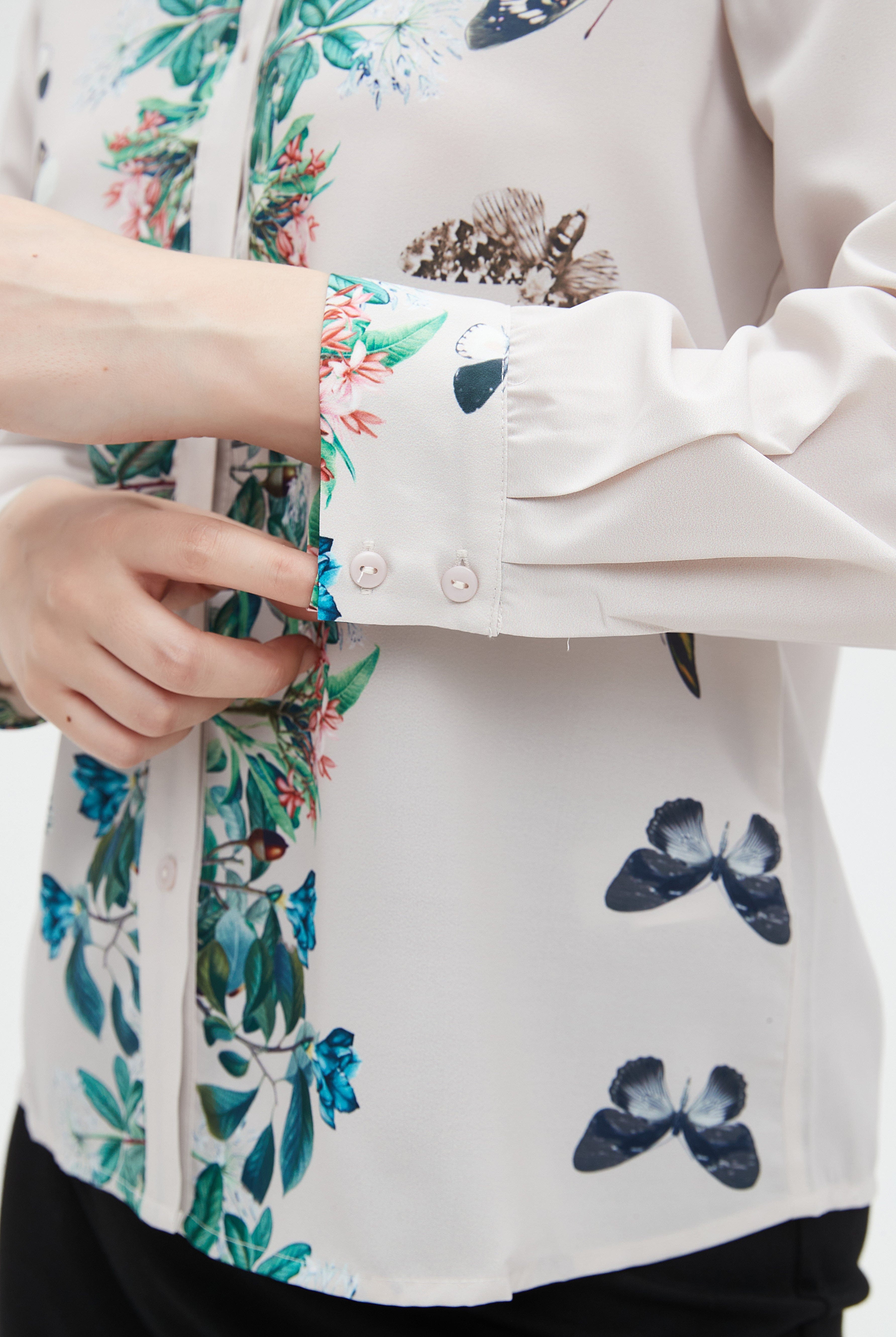 نتشي بلوزة نسائية بأكمام طويلة وطبعة ورد