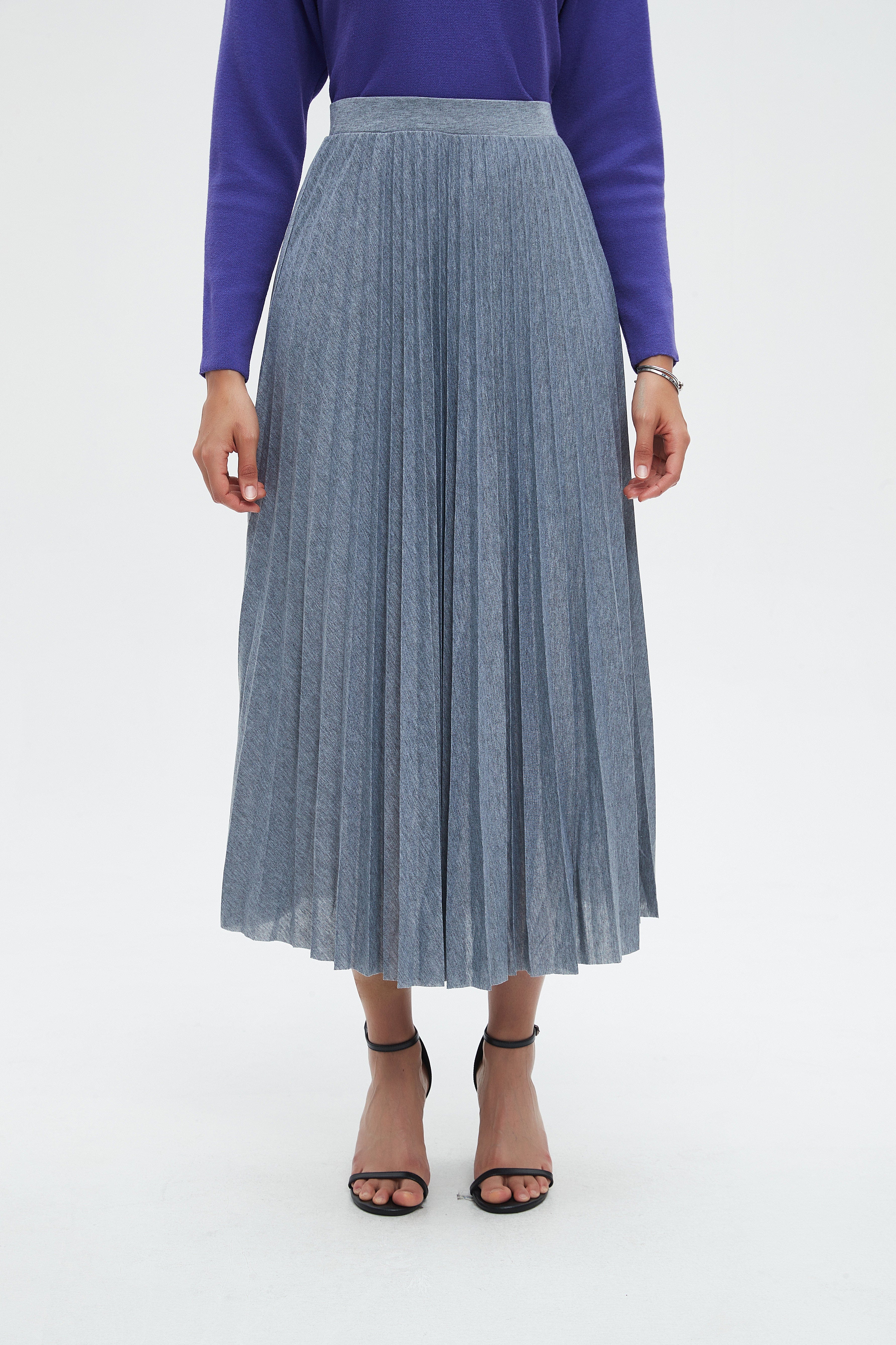 نتشي تنورة ميدي بليسية وخصر مطاط