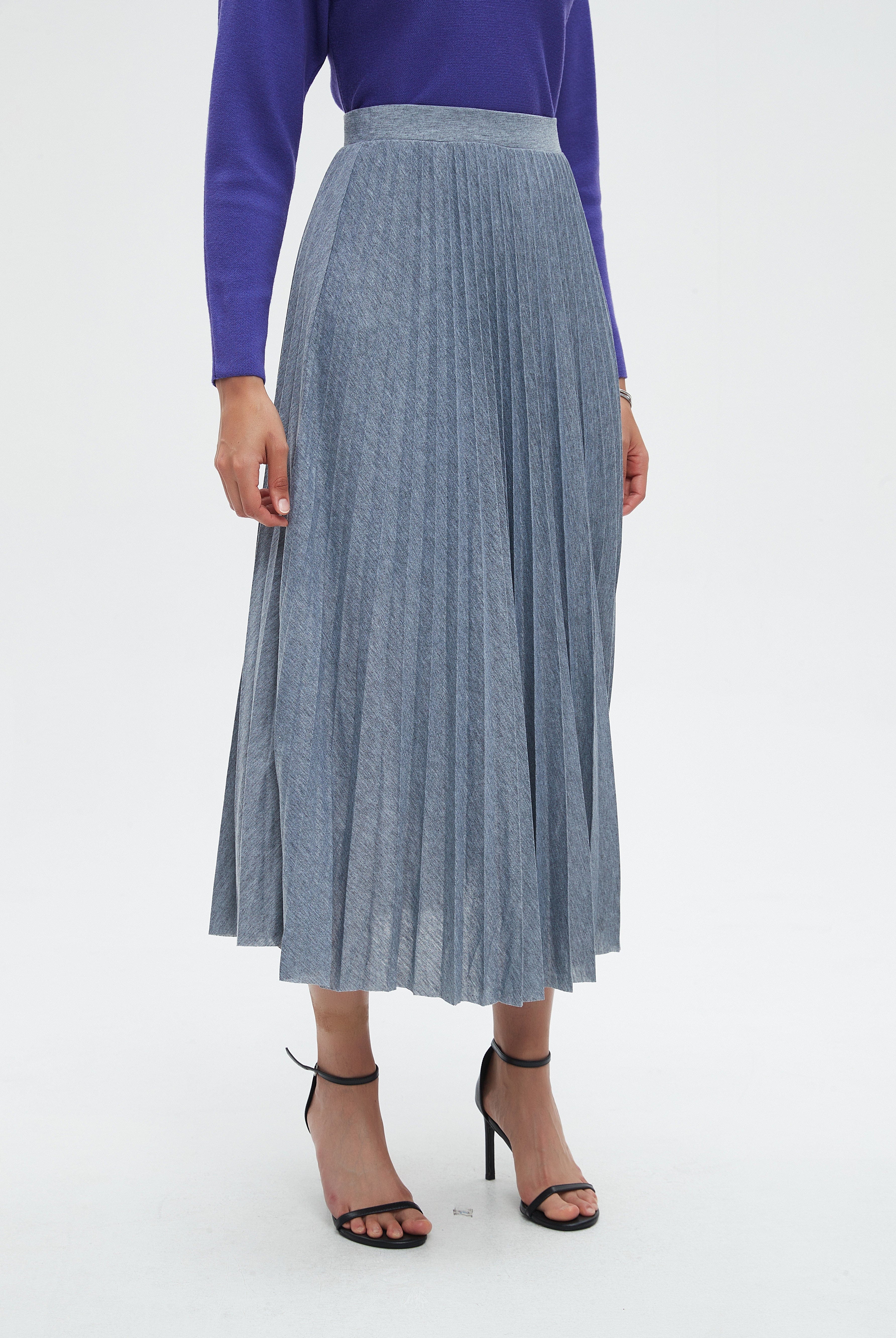 نتشي تنورة ميدي بليسية وخصر مطاط