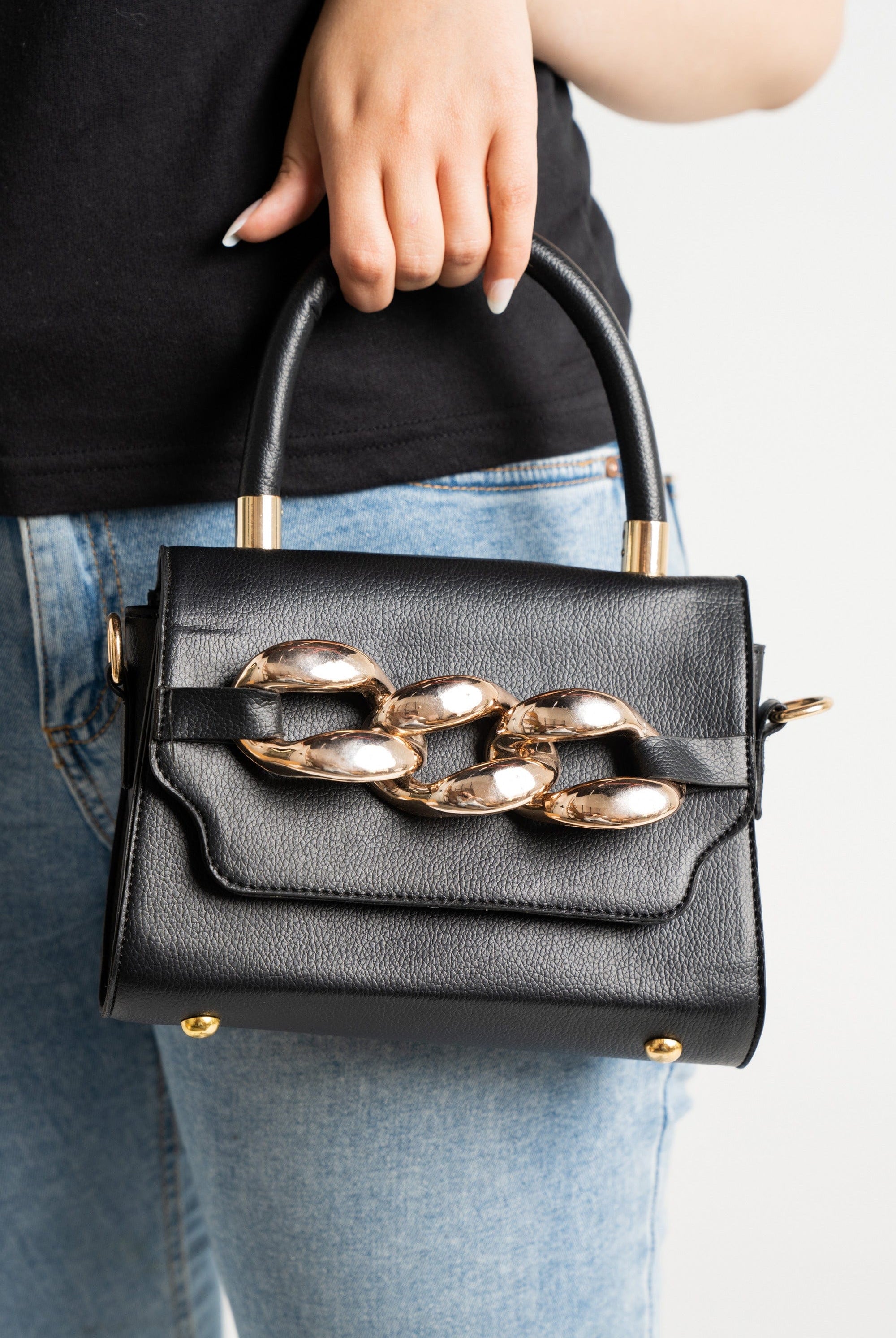 داليدرس حقيبة يد جلد بحلقات معدنية أسود