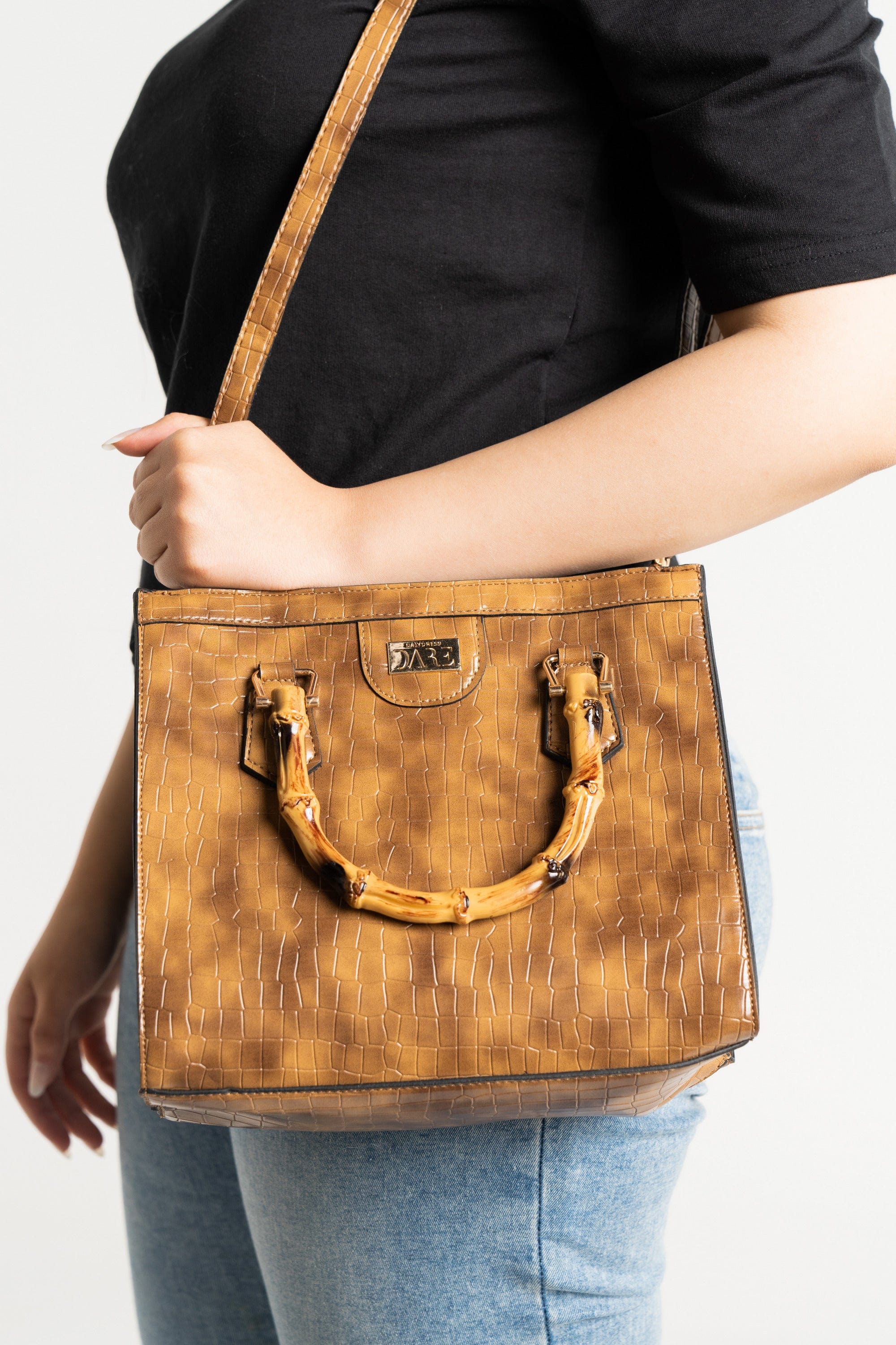 داليدرس حقيبة يد جلد نمر لامع نسائي بني