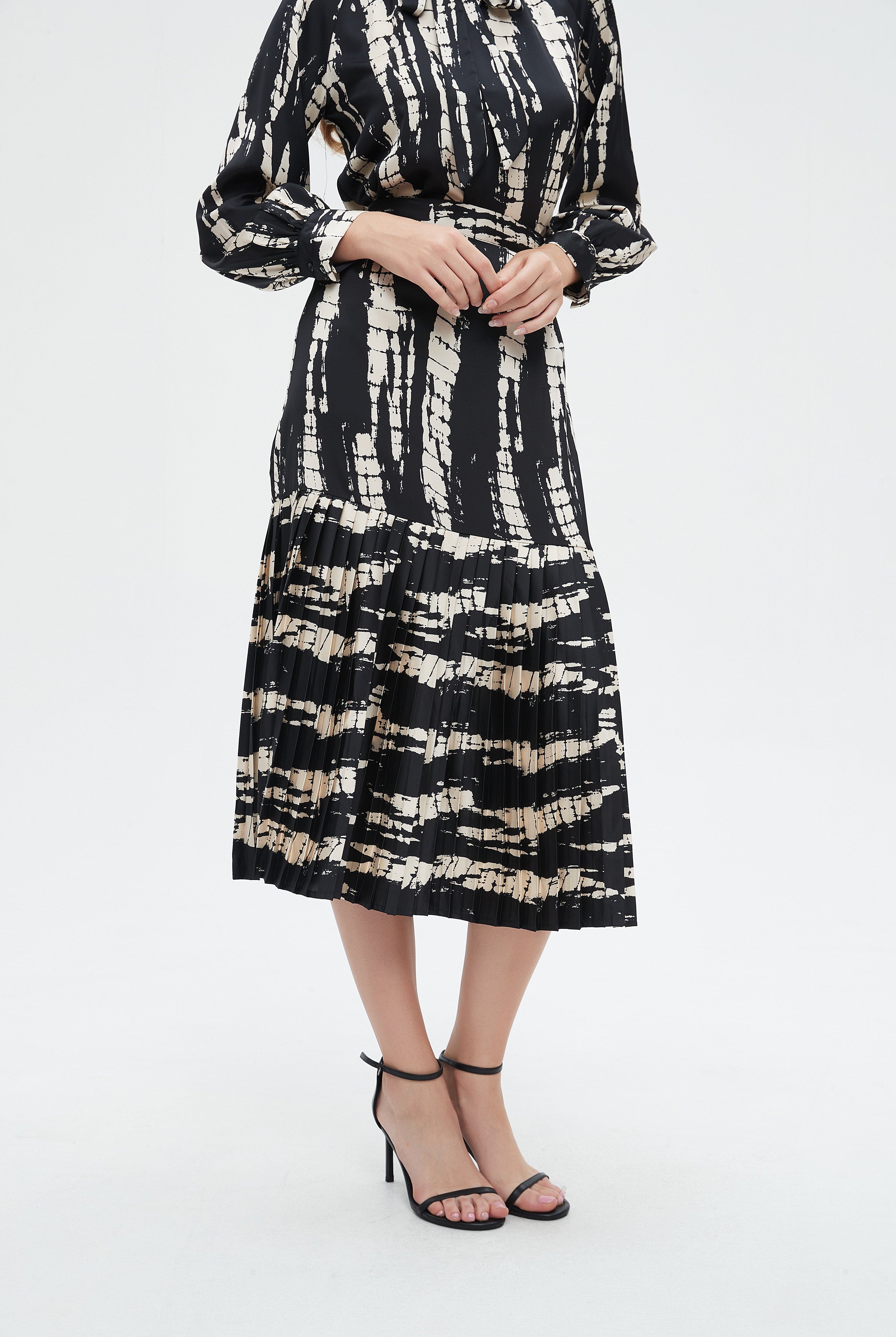 نتشي تنورة نسائية مخططة ميدي بقصة واسعة