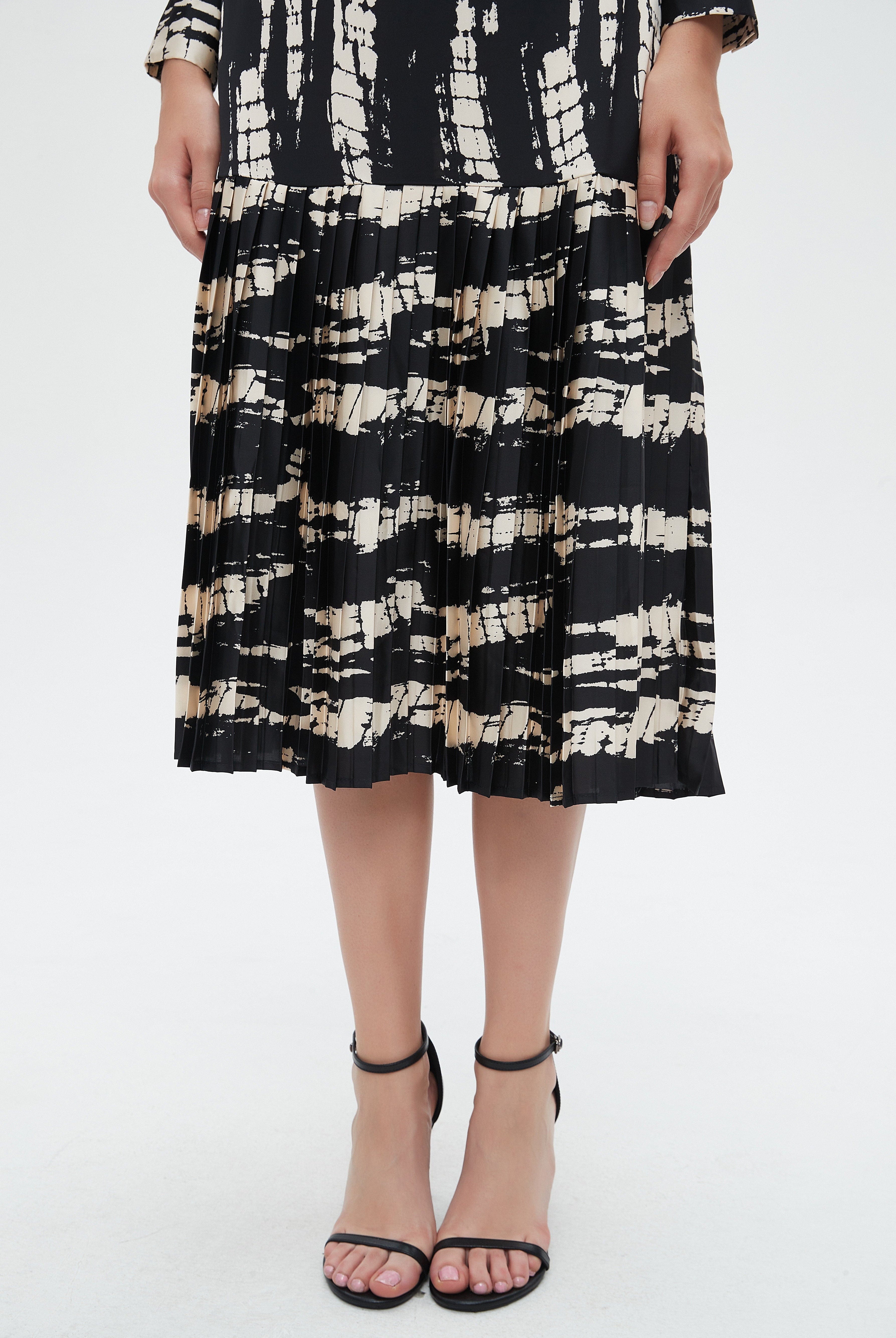 نتشي تنورة نسائية مخططة ميدي بقصة واسعة