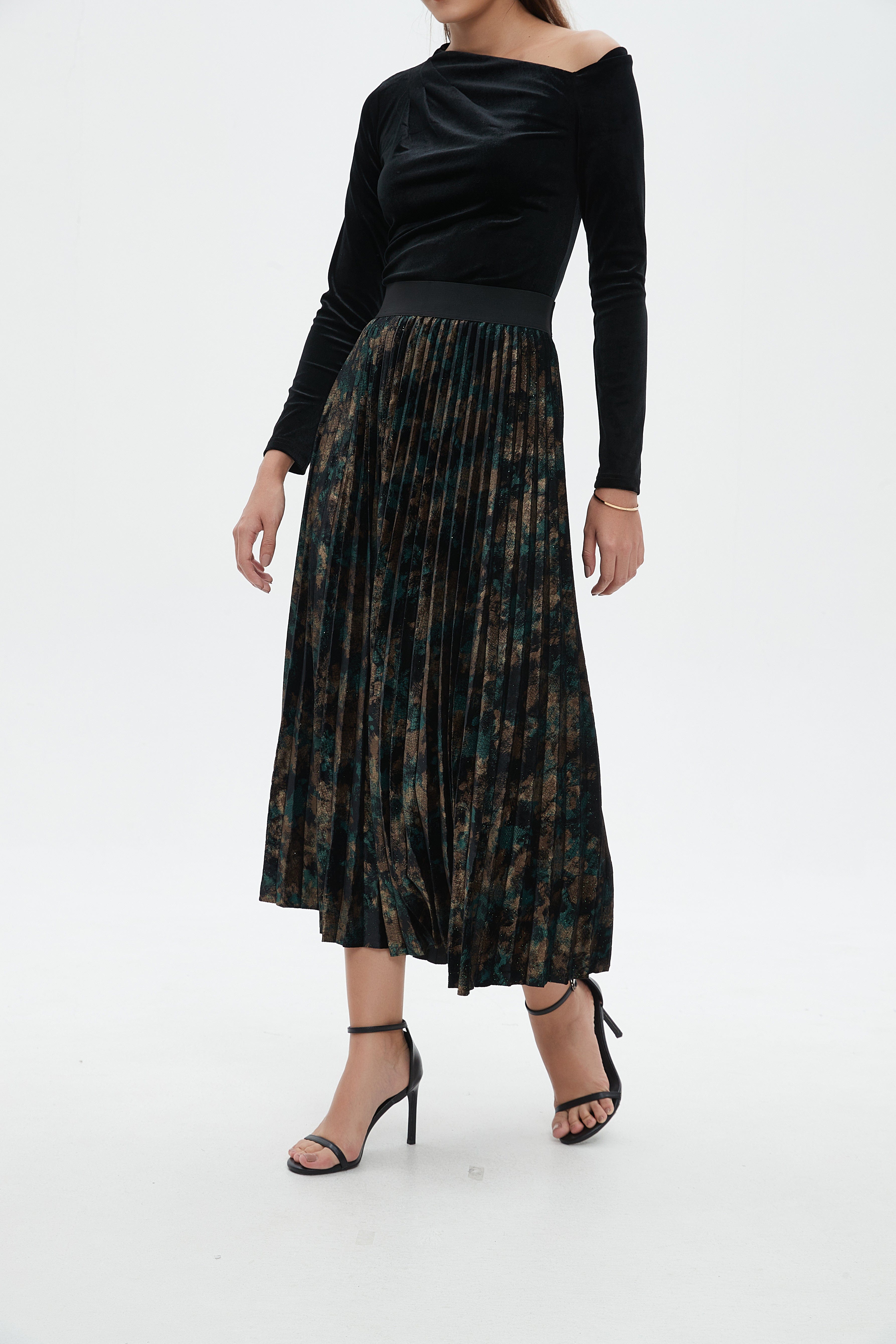 نتشي تنورة ميدي نسائية بليسيه منقوشة