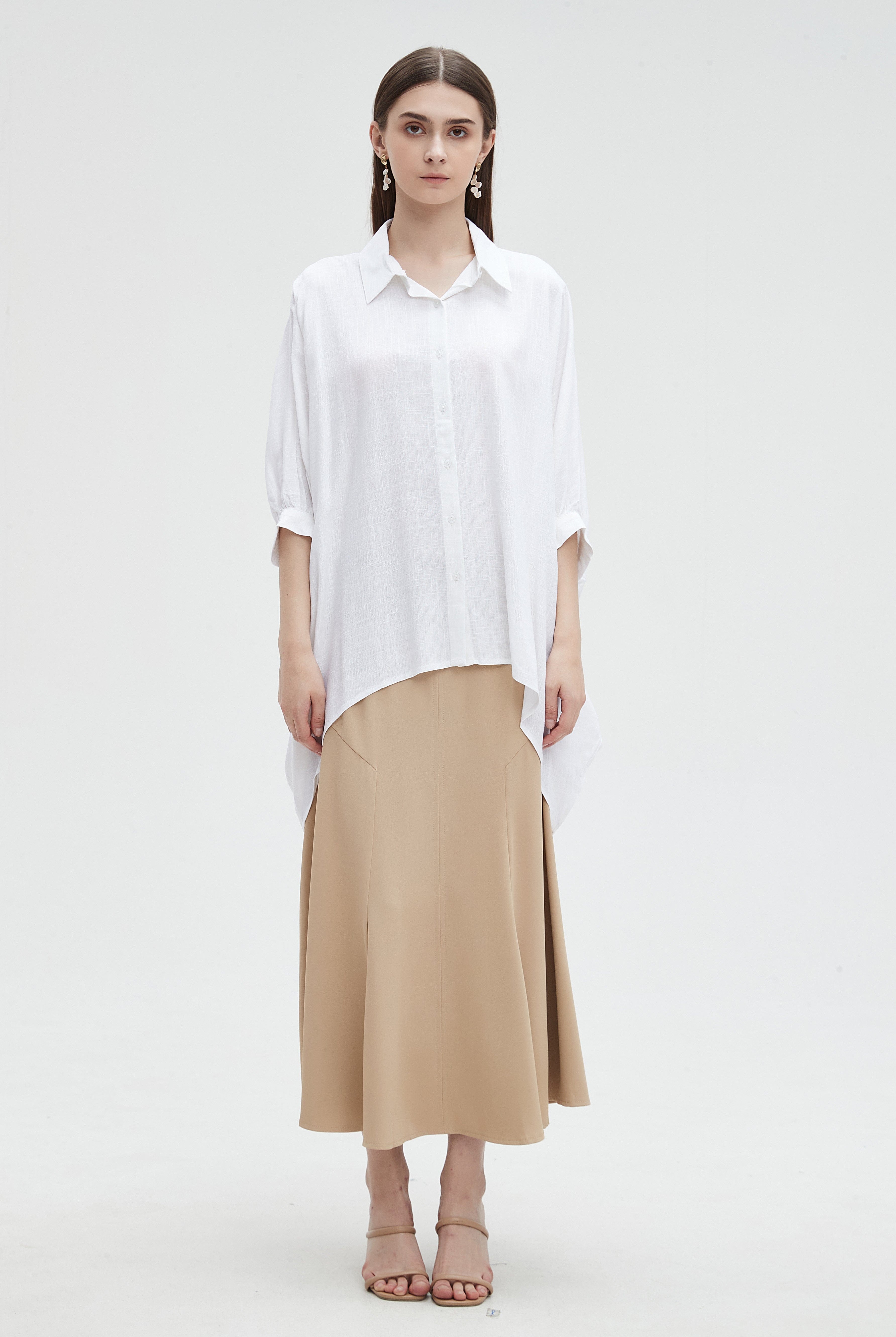 ميكا بلوزة نسائية 3/4 كم سادة بأزرار