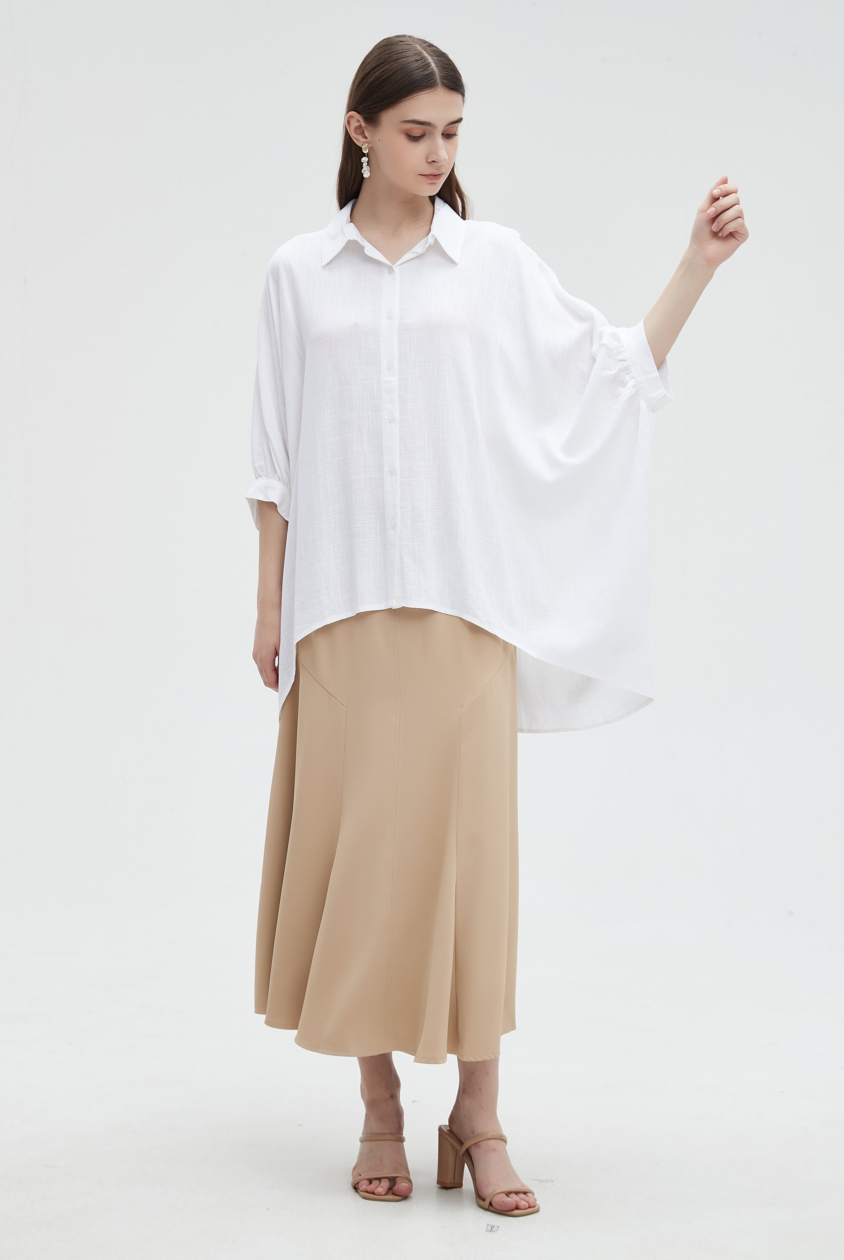 ميكا بلوزة نسائية 3/4 كم سادة بأزرار