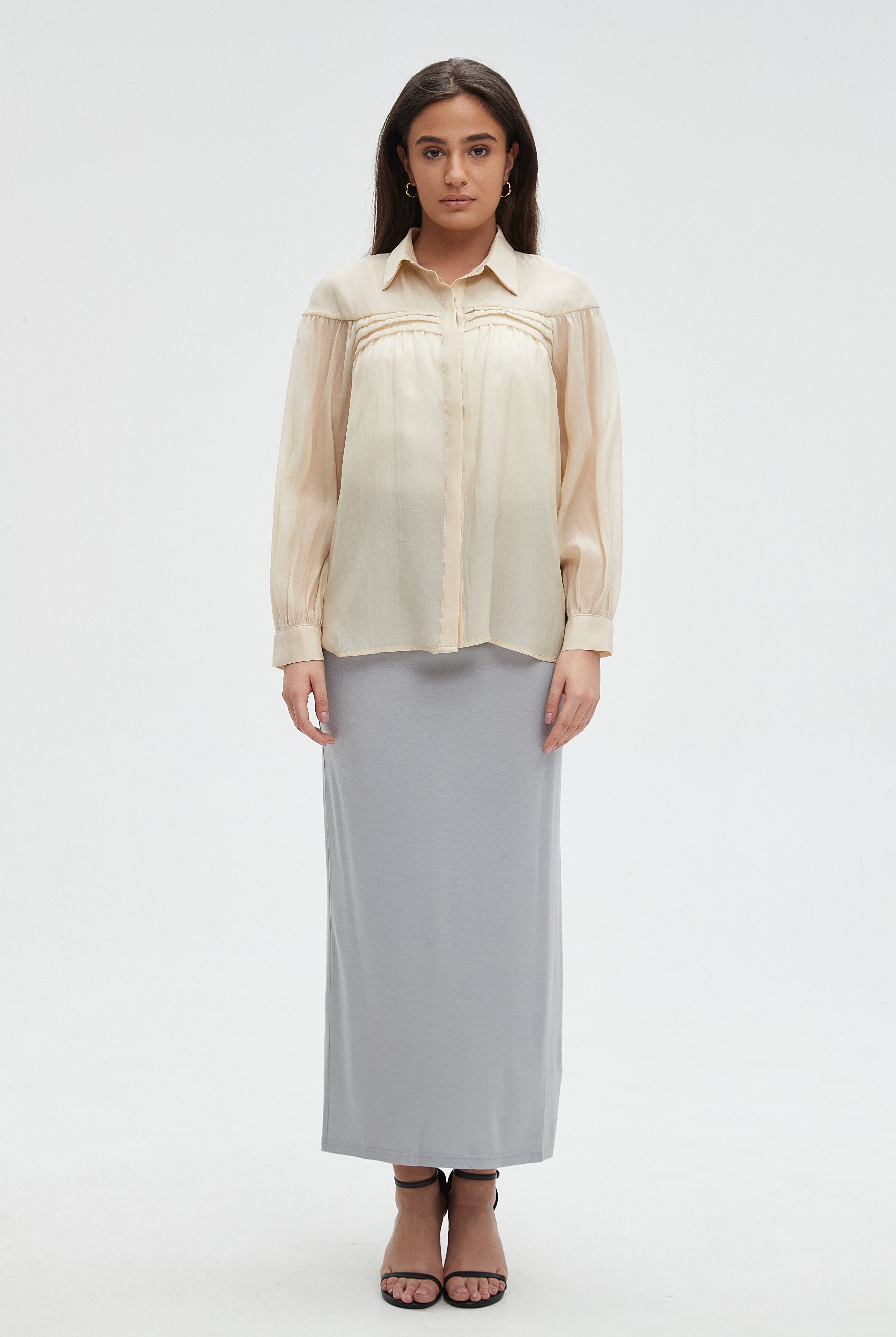 ميكا بلوزة نسائية كم طويل سادة بأزرار من الأمام