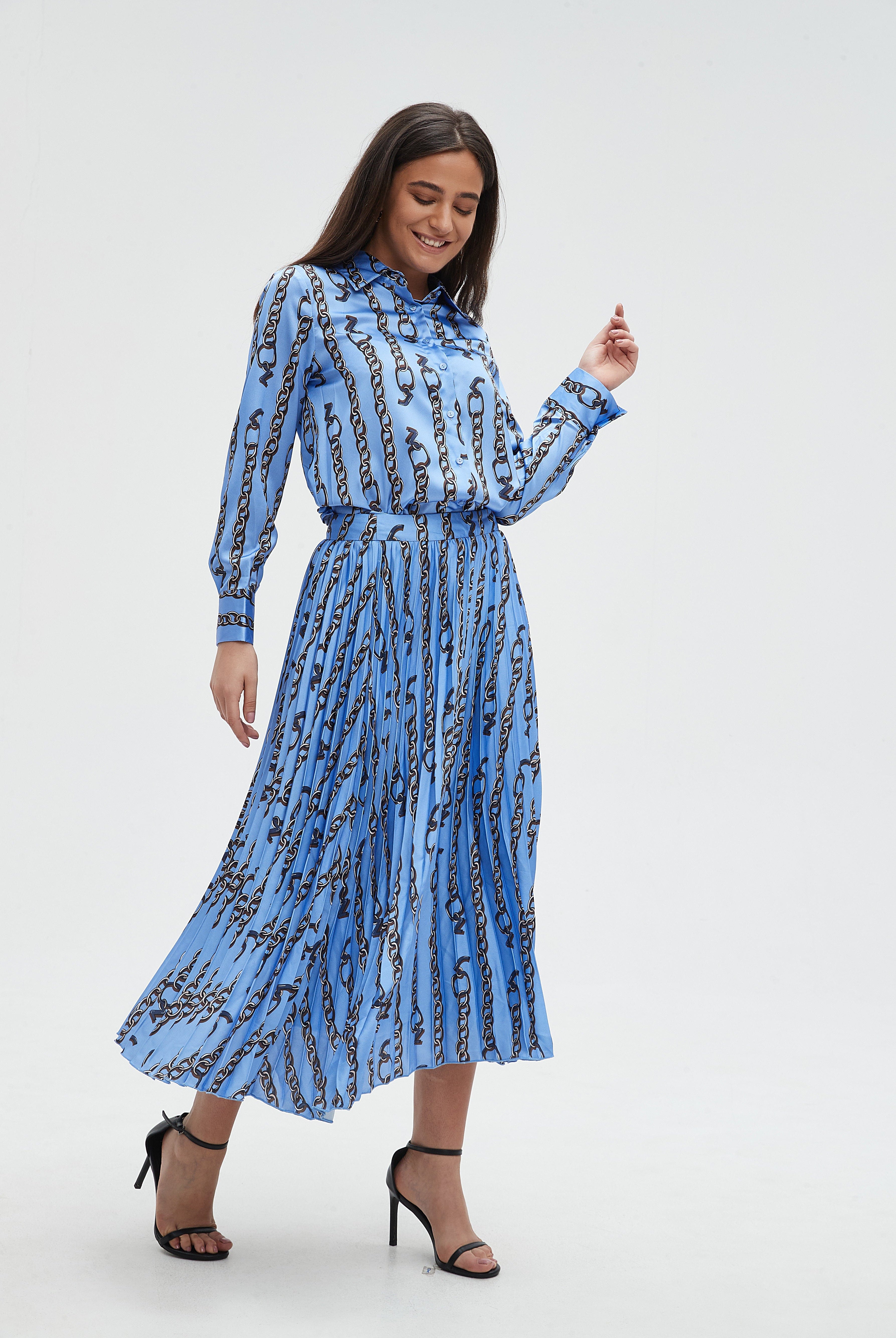 ميكا تنورة نسائية ميدي كشكش منقوشة