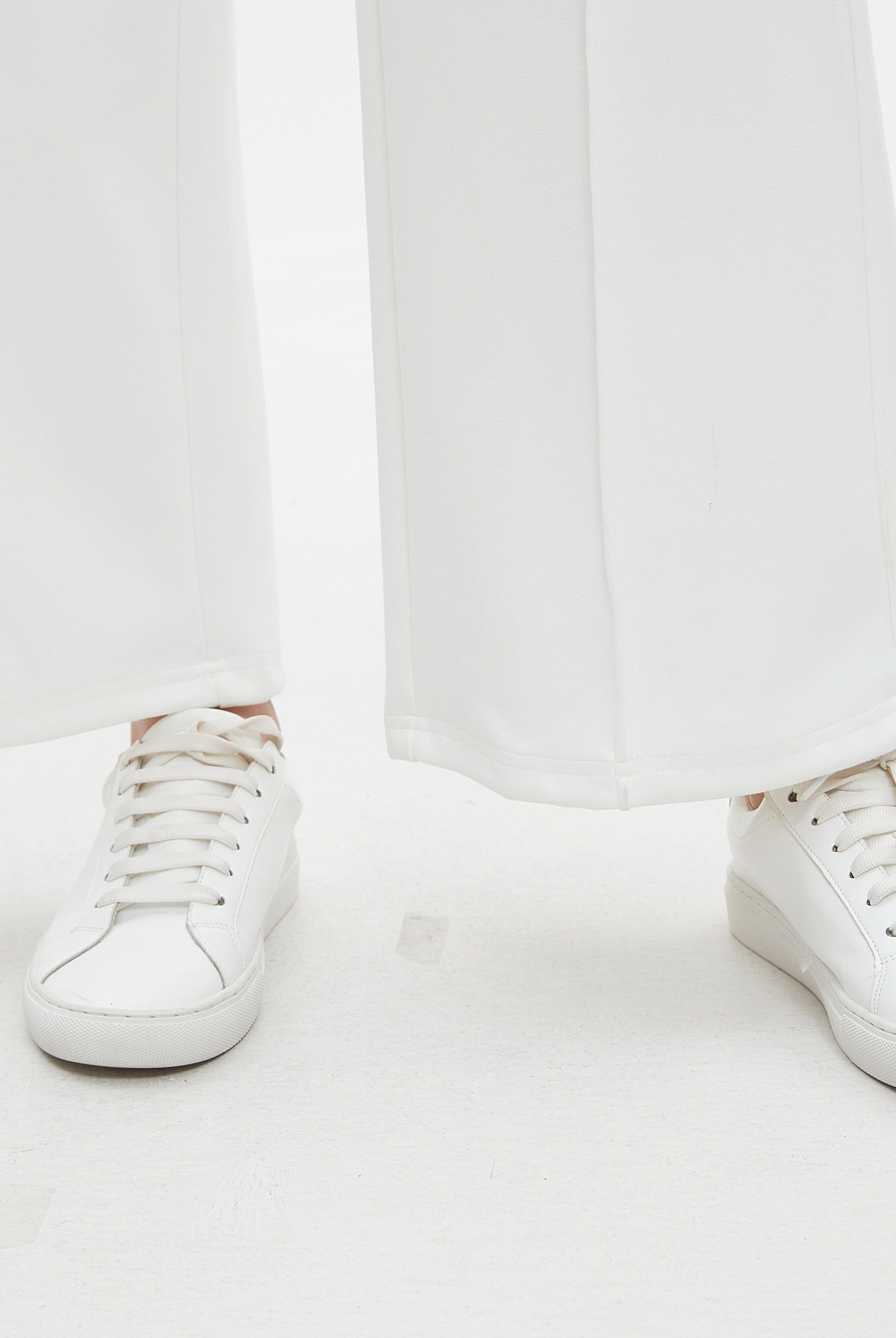 نتشي بنطال طويل سادة واسع من الأسفل