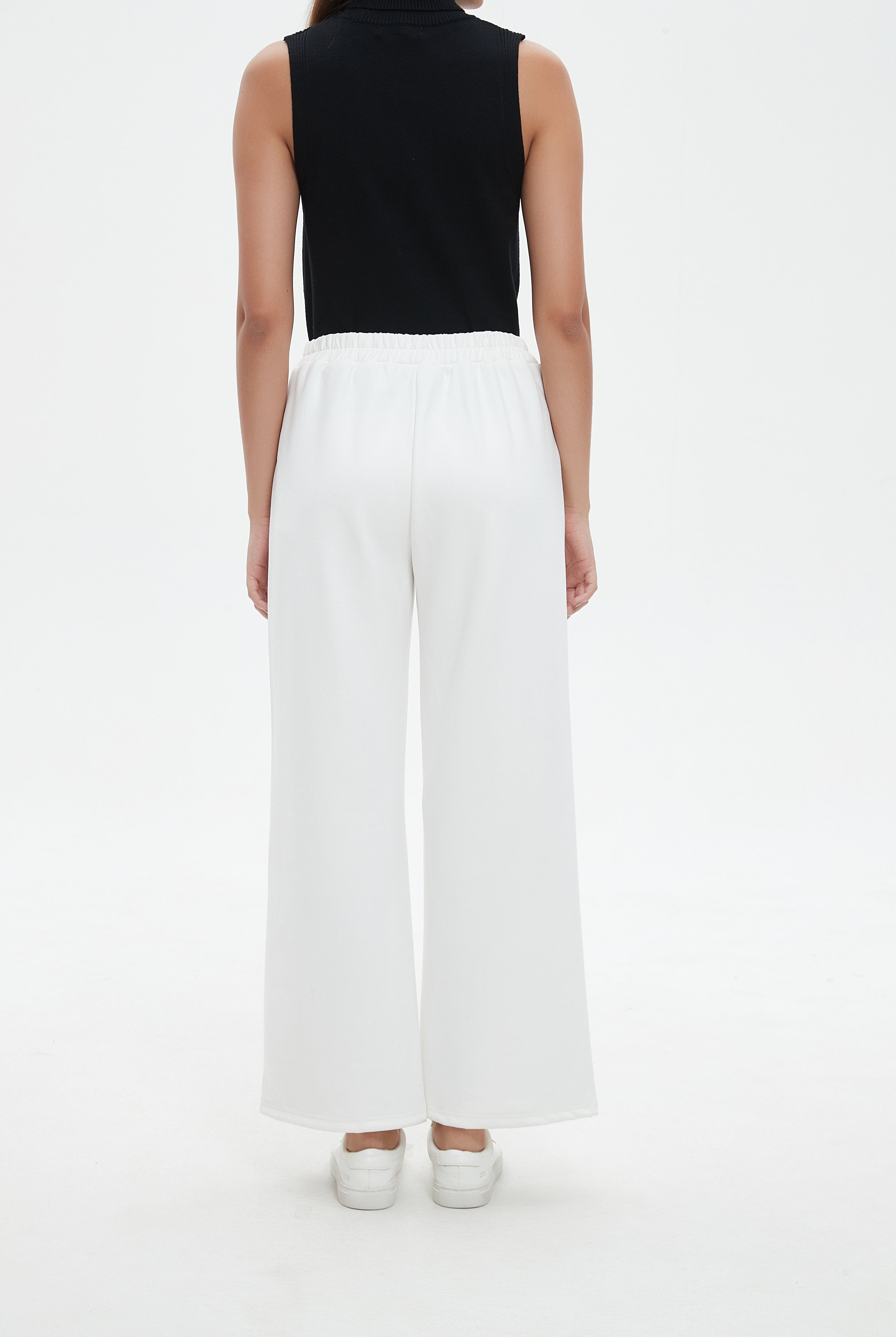 نتشي بنطال طويل سادة واسع من الأسفل