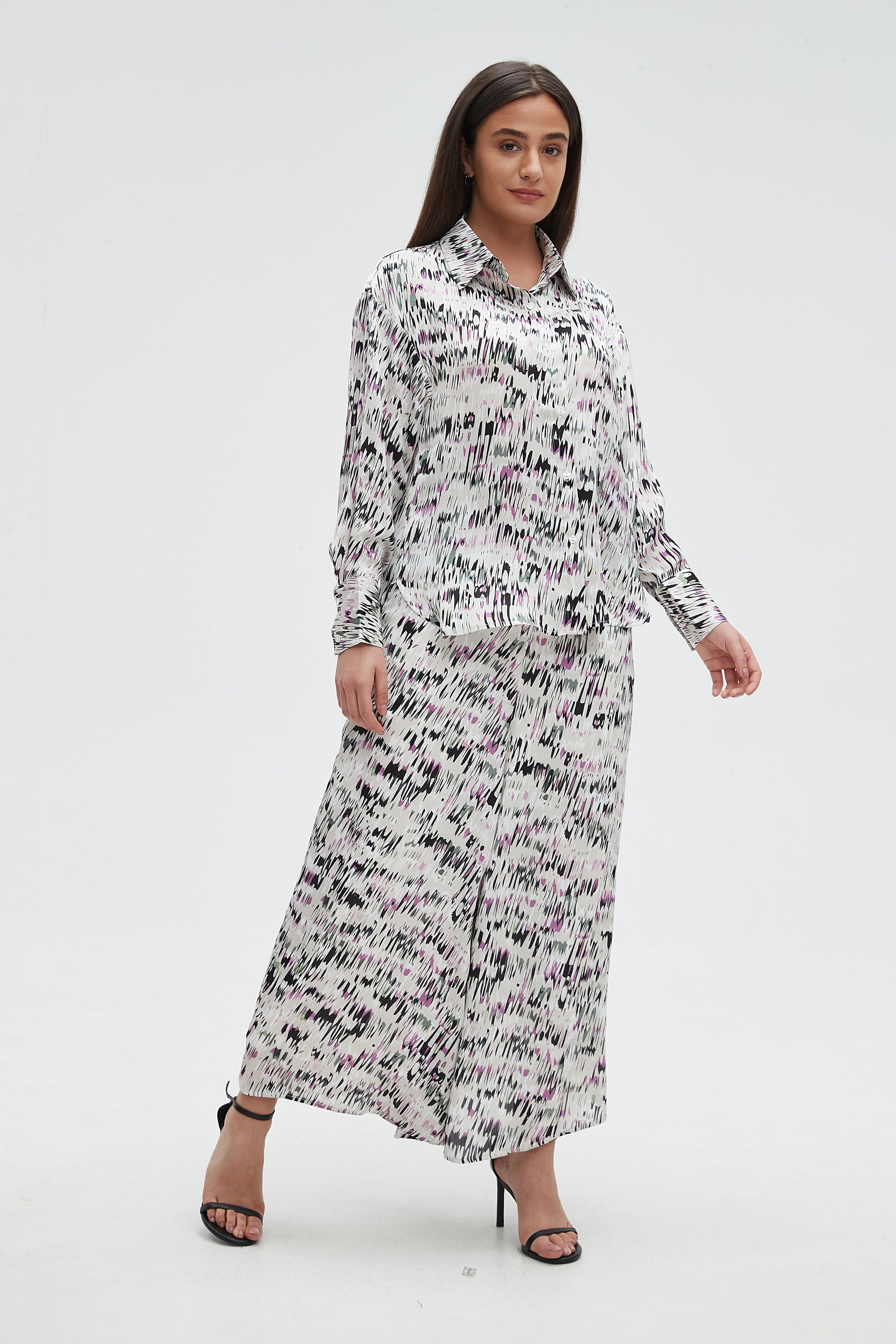 ميكا بنطلون نسائي 3/4 مشجر برجل واسعة