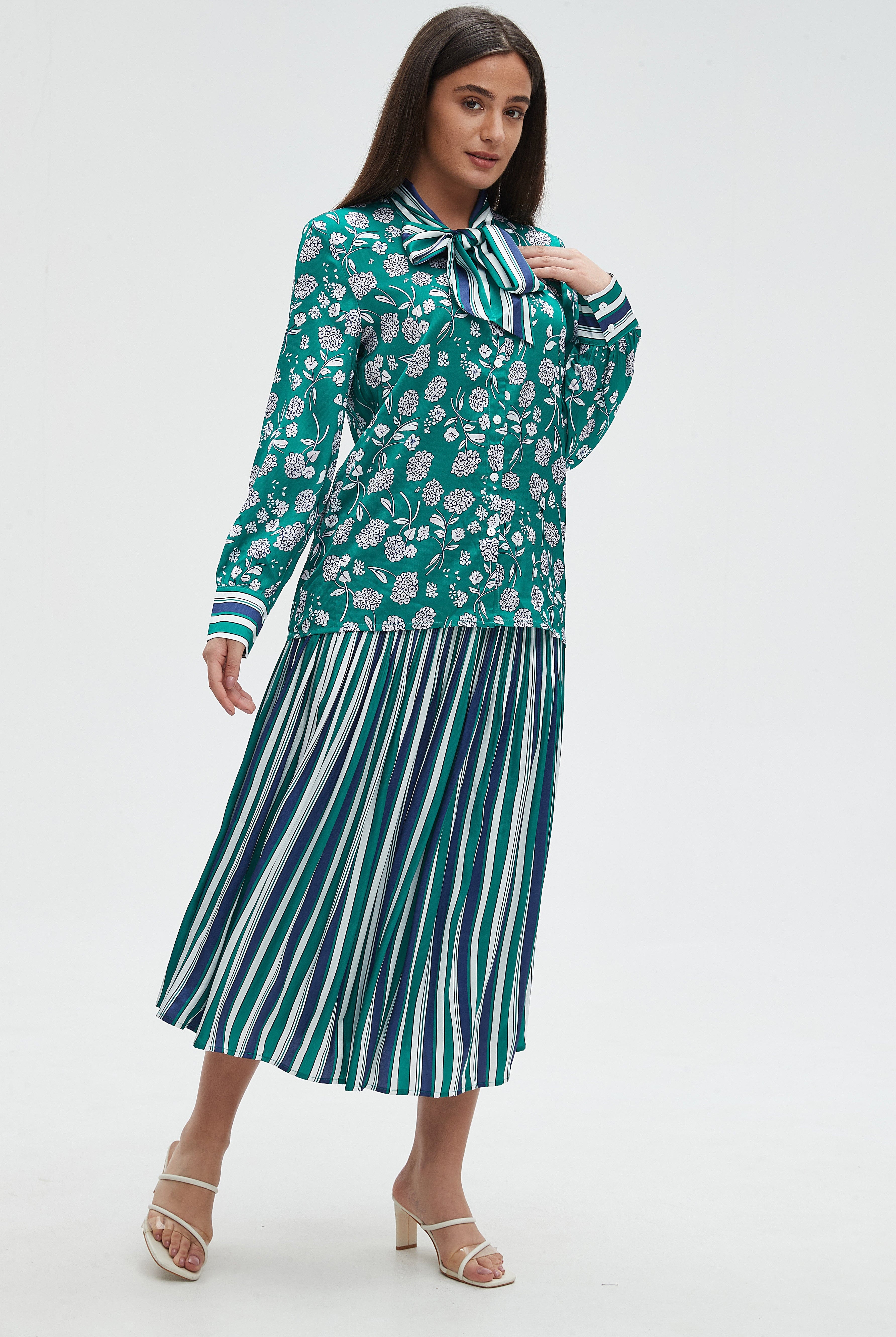 ميكا تنورة ميدي مخططة بالطول الوان