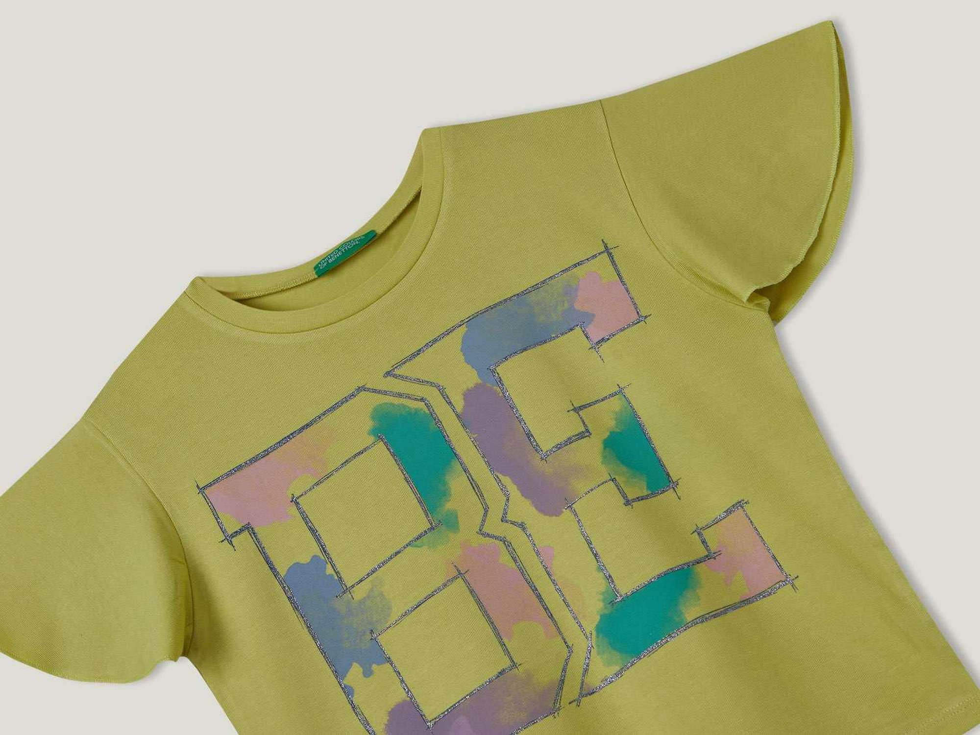 يونايتد كولورز اوف بينيتون تيشيرت بطبعة "BE" ماكسي نص كم أطفالي