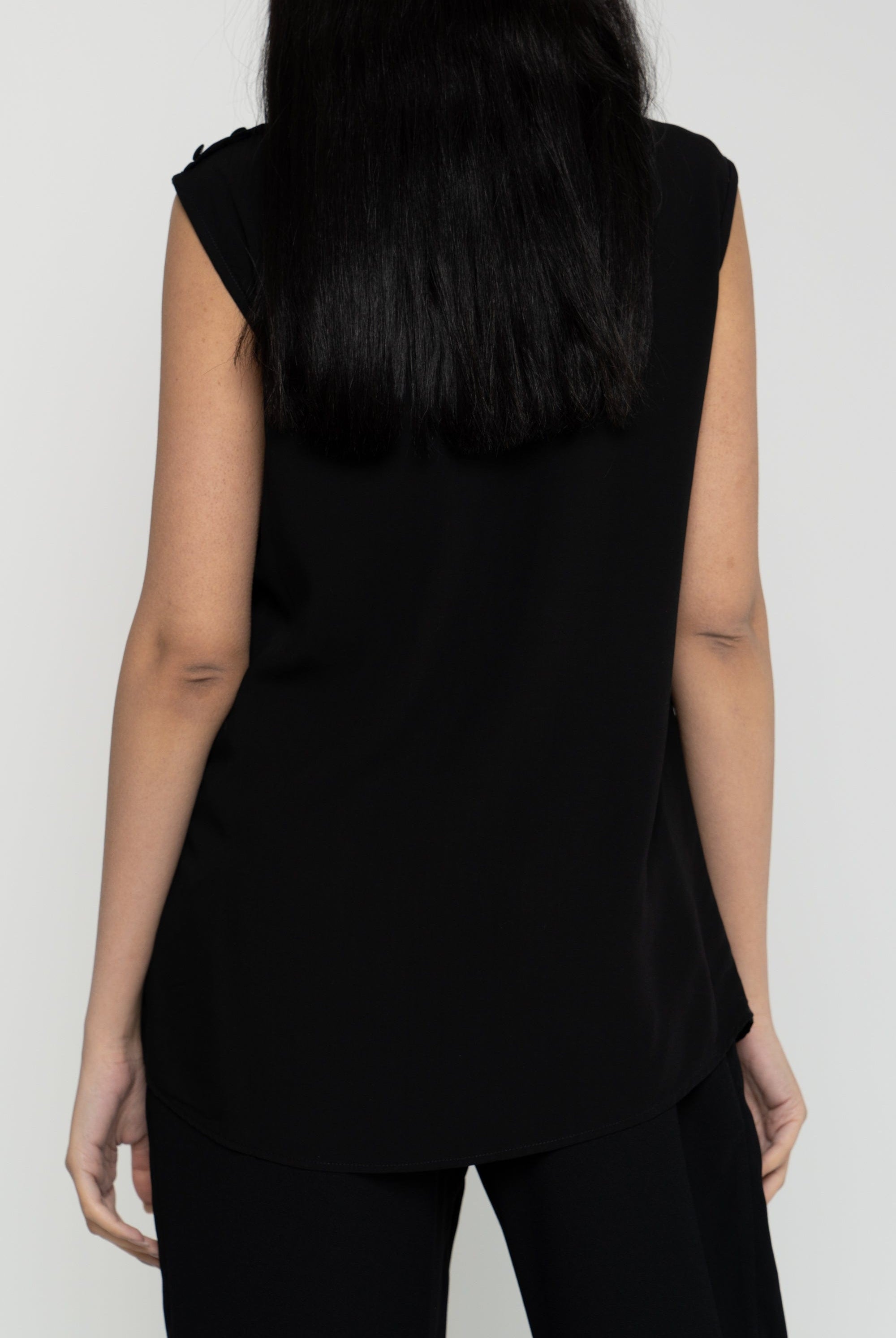 داليدرس بلوزة نسائة سادة بدون أكمام