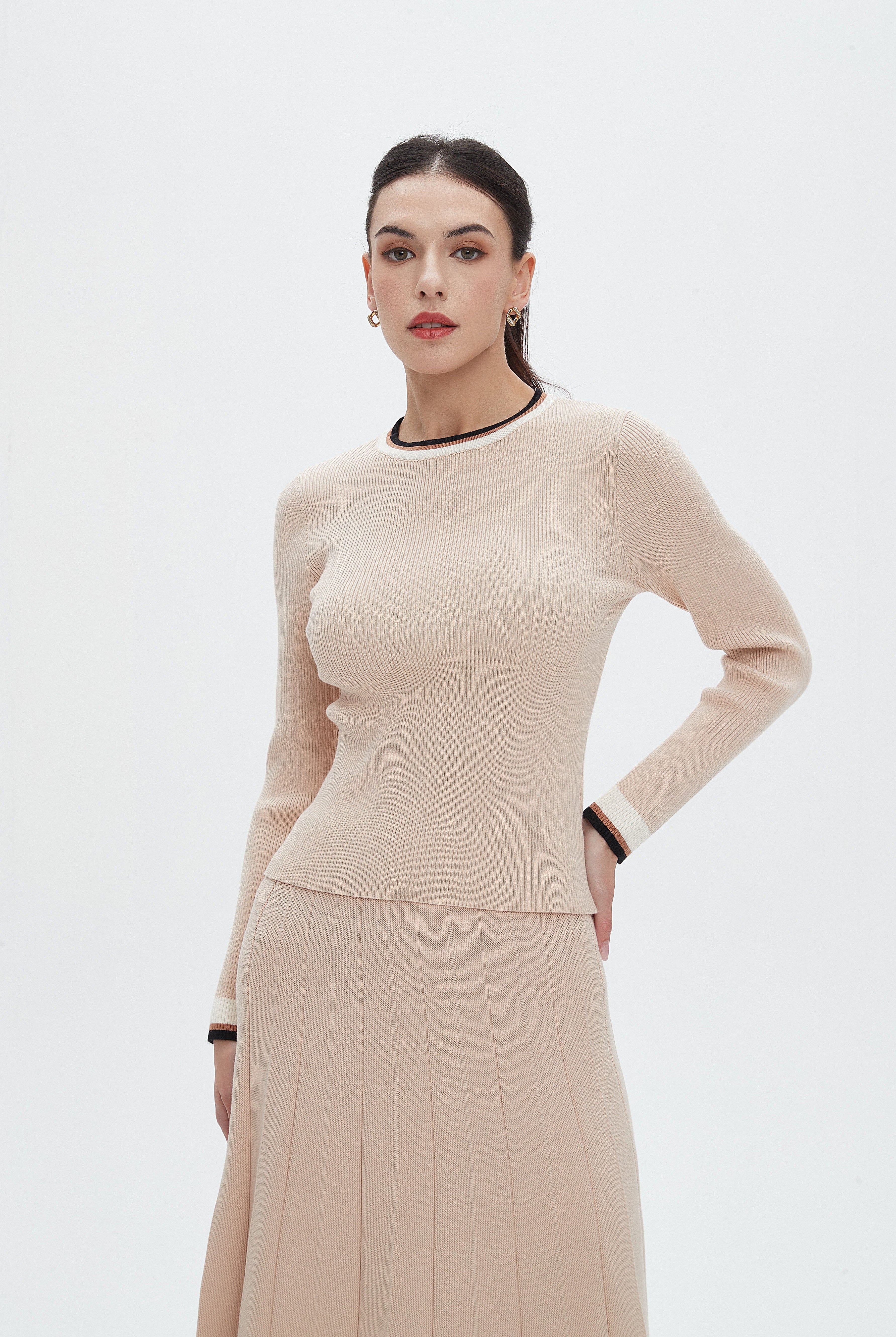 نتشي بلوزة نسائية سادة بطول الخصربأكمام طويلة ورقبة مستديرة