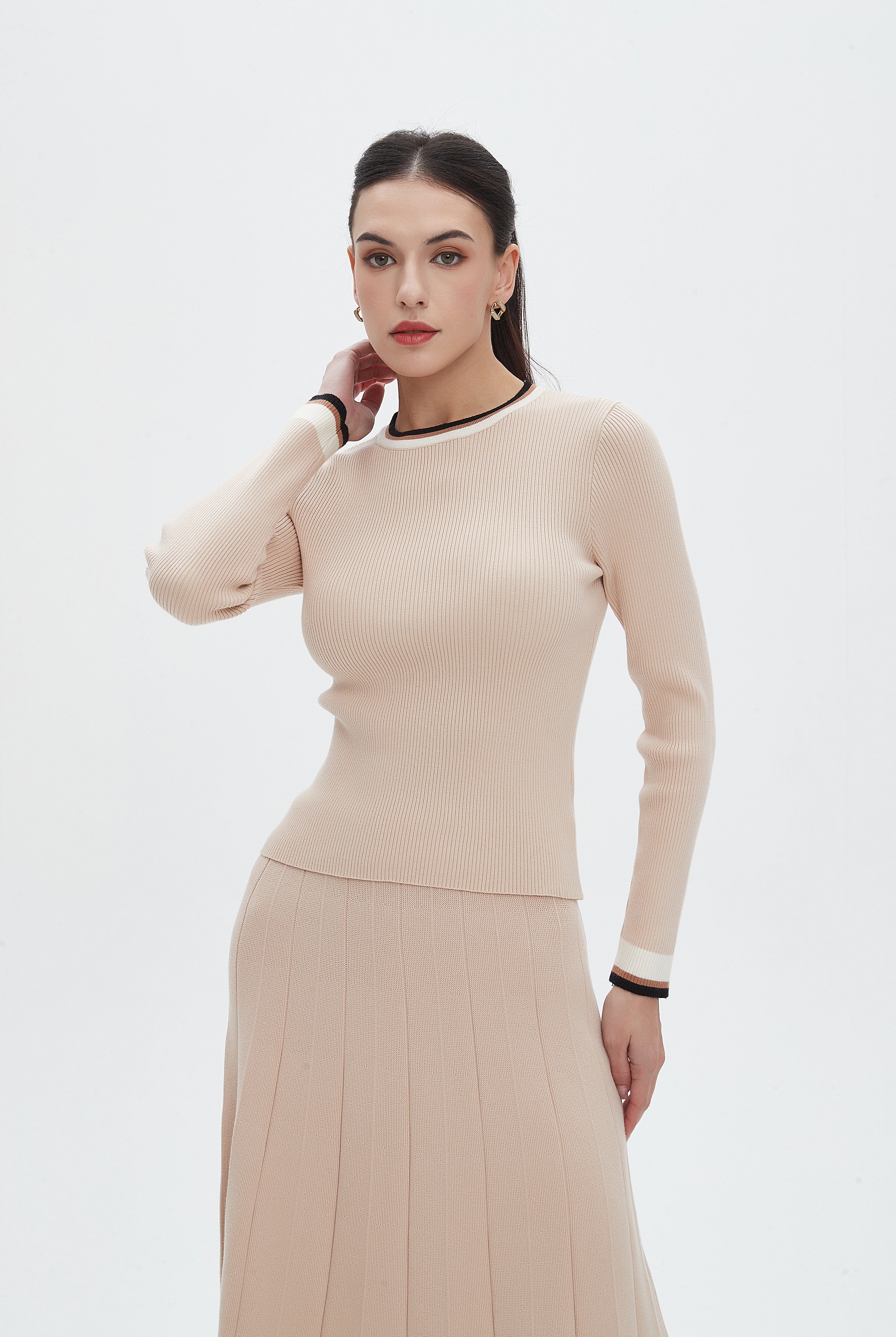 نتشي بلوزة نسائية سادة بطول الخصربأكمام طويلة ورقبة مستديرة