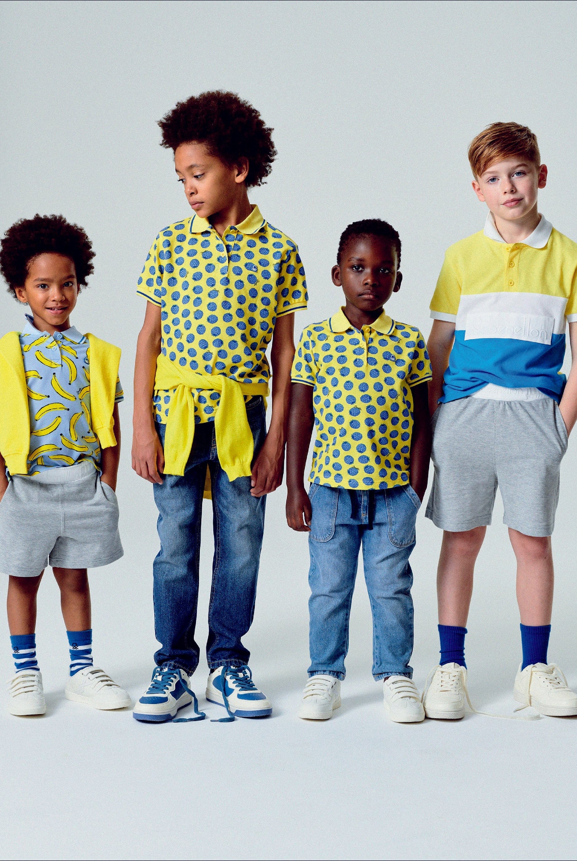 يونايتد كولورز اوف بينيتون تي شيرت بولو منقوش بالكامل بشعار مطبوع على الصدر أطفالي