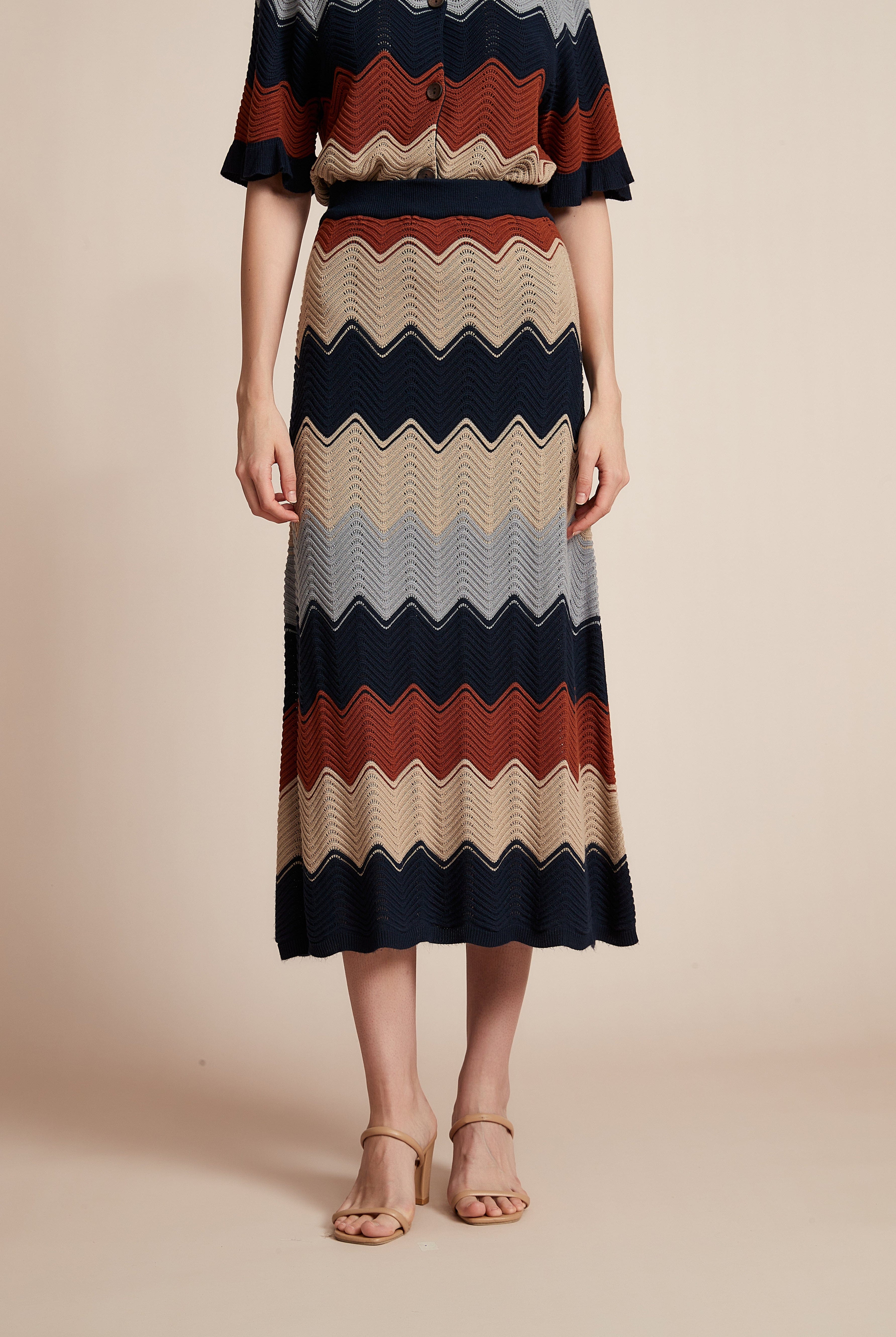 يولا تنورة نسائية ميدي واسعة ألوان تريكو