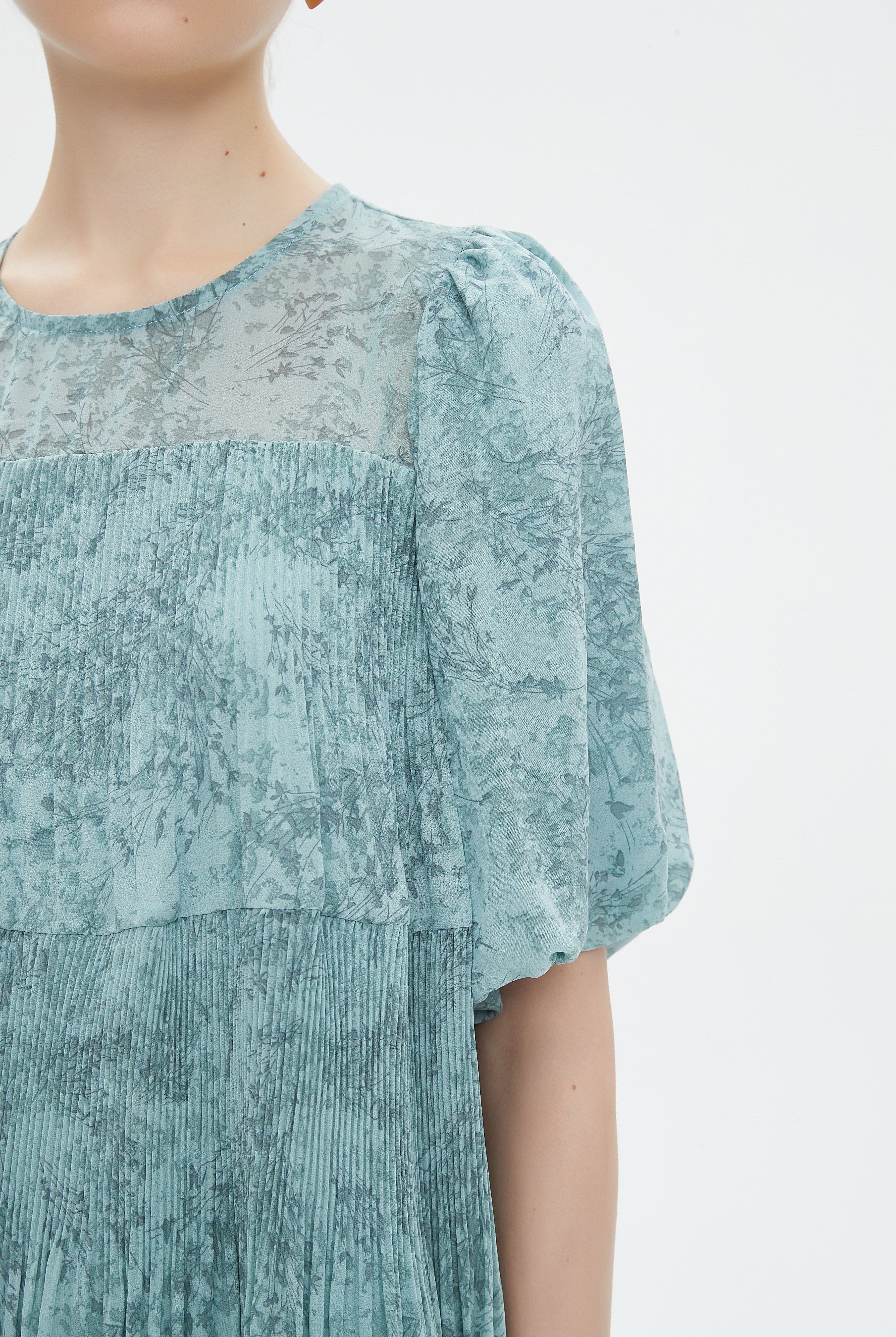 نتشي توب شفاف مشجر نص كم بف نسائي