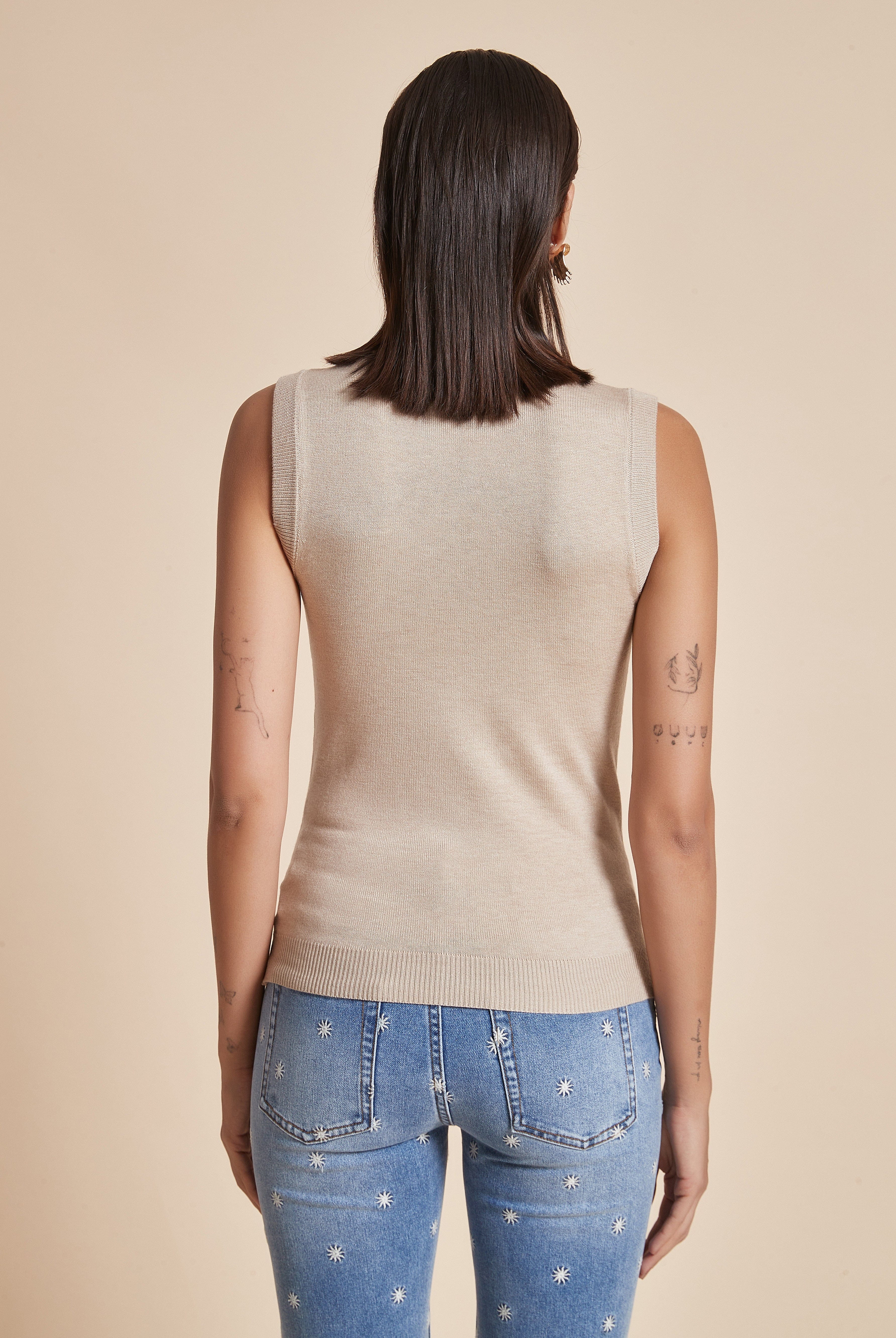 يولا بلوزة نسائية بدون أكمام برقبة عالية سادة