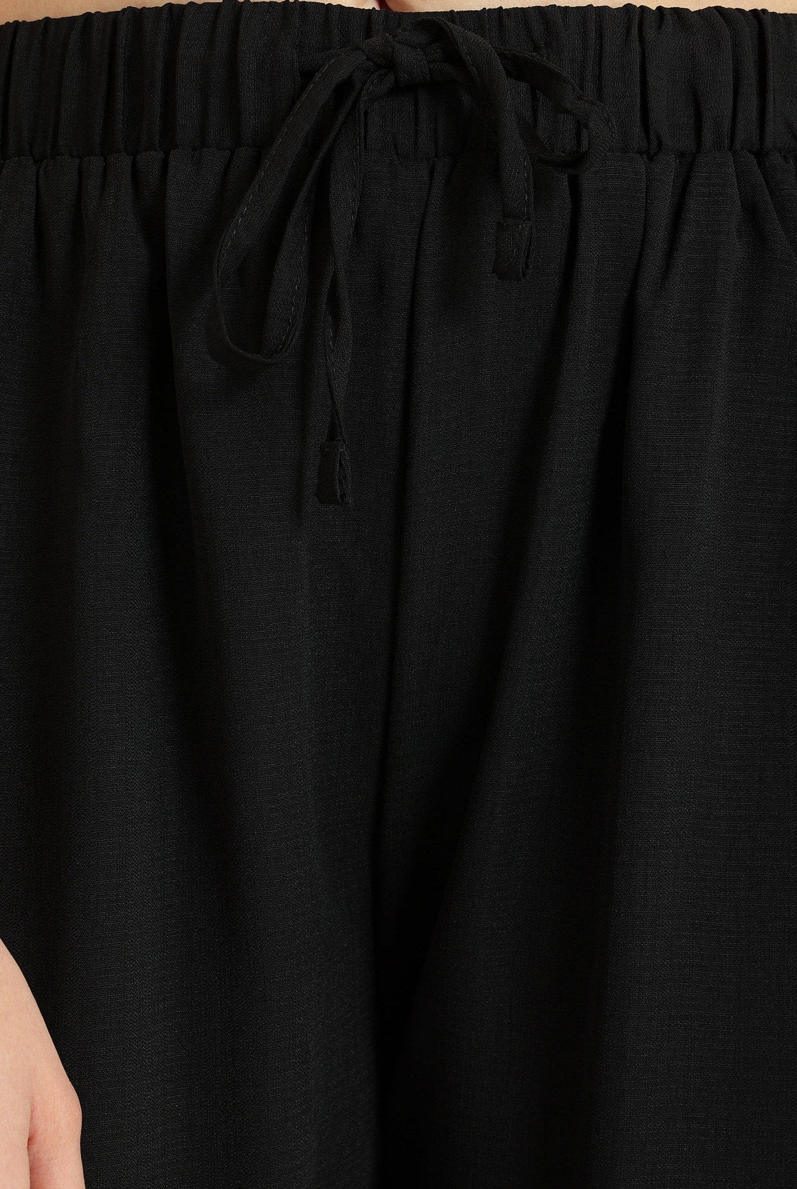 كارينا بنطلون وايد ليج سادة بخصر مطاطي