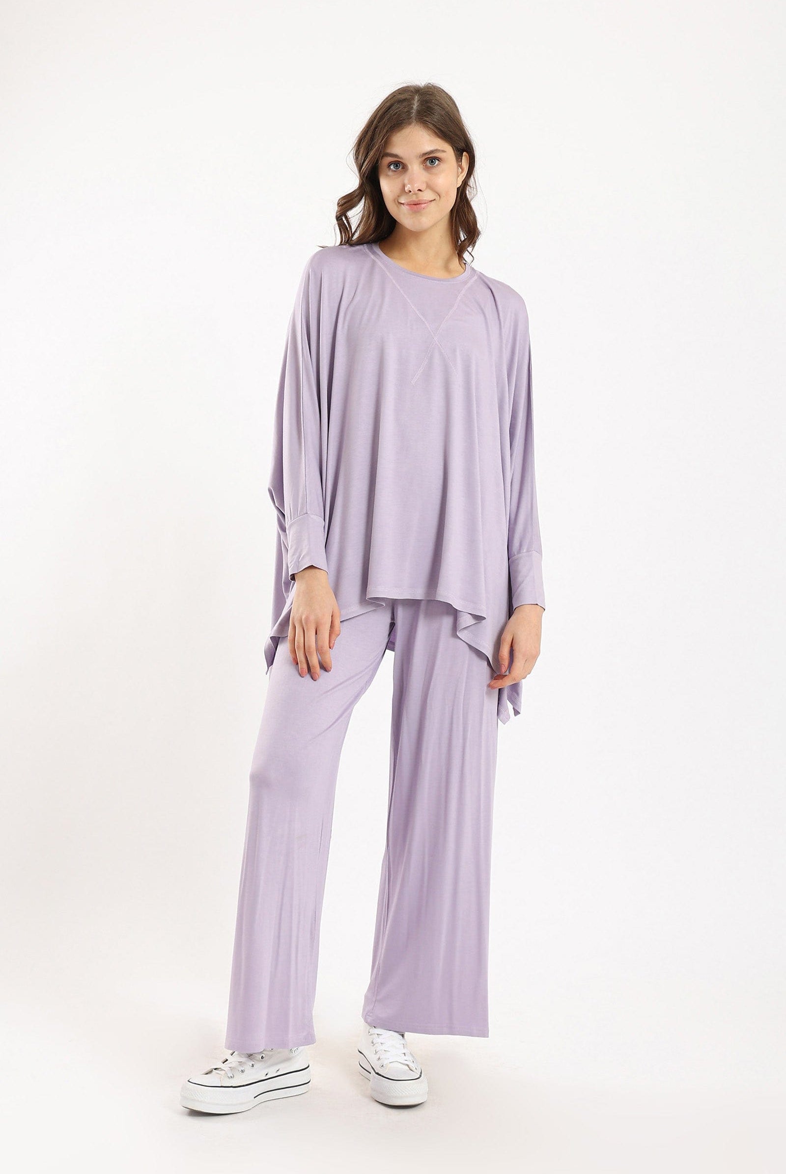 كارينا بلوزة سادة أوفر سايز غير متساوية من أسفل كم طويل