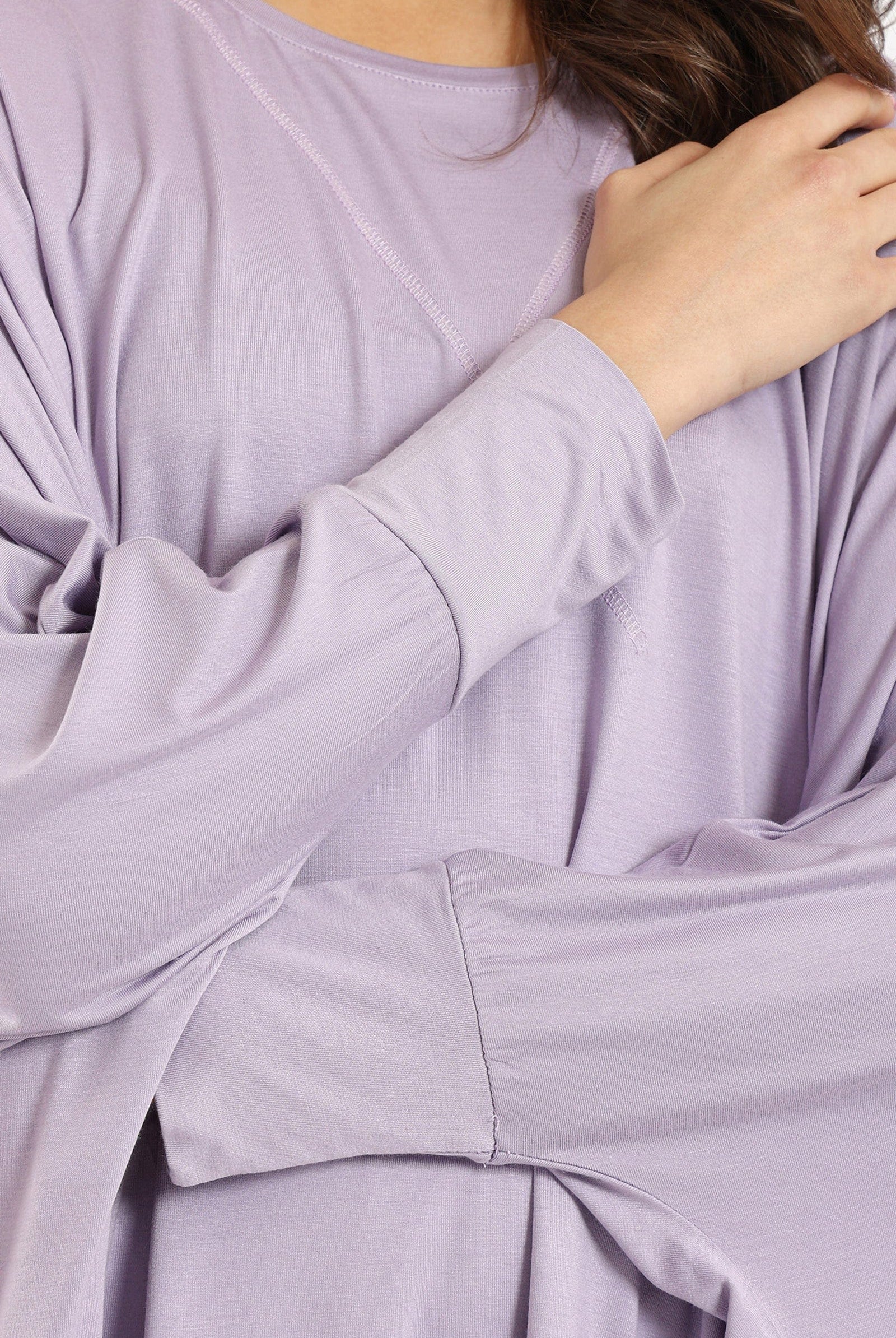 كارينا بلوزة سادة أوفر سايز غير متساوية من أسفل كم طويل