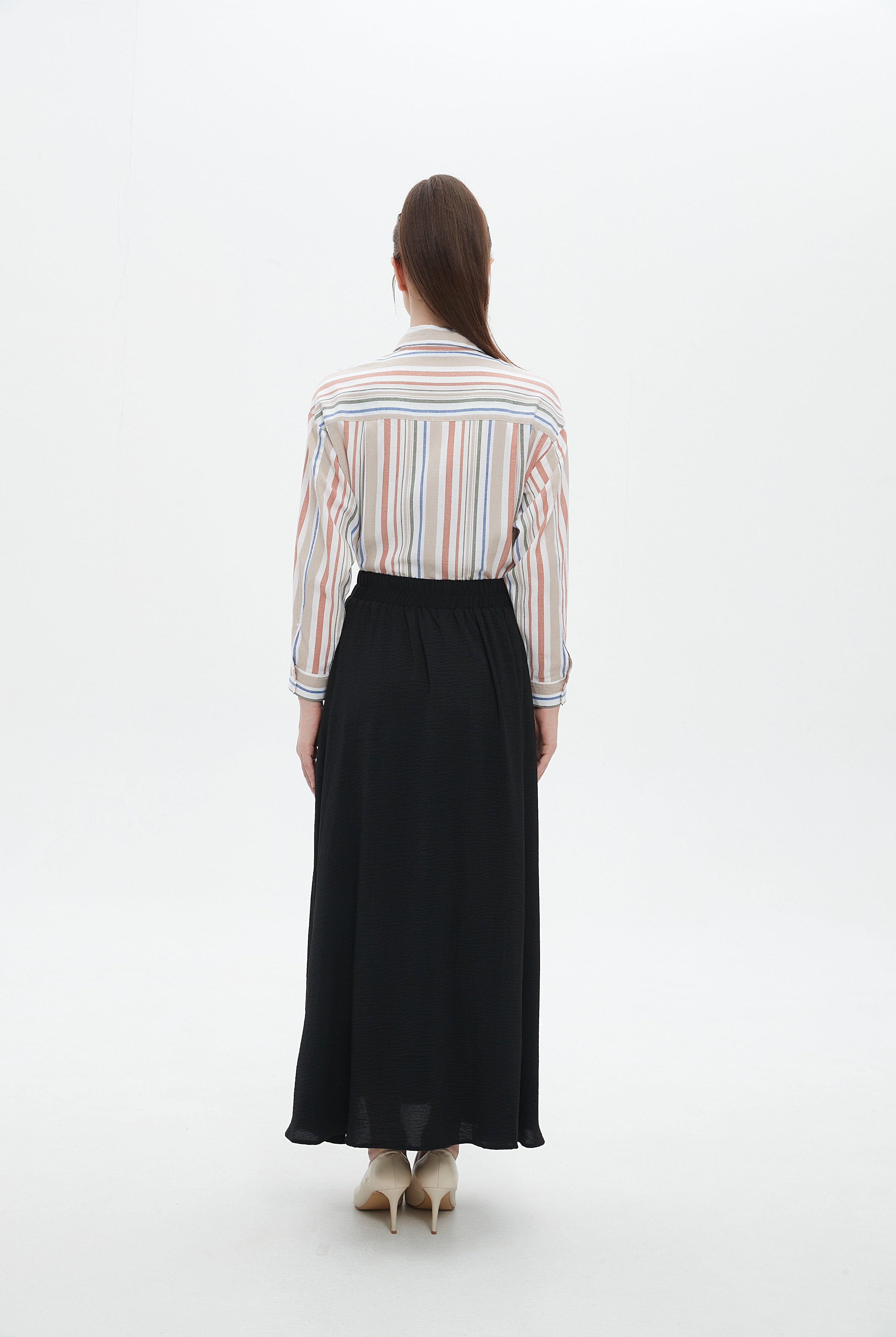 ميكا تنورة نسائية طويلة سادة بخصر كشكش واسعة للدوام