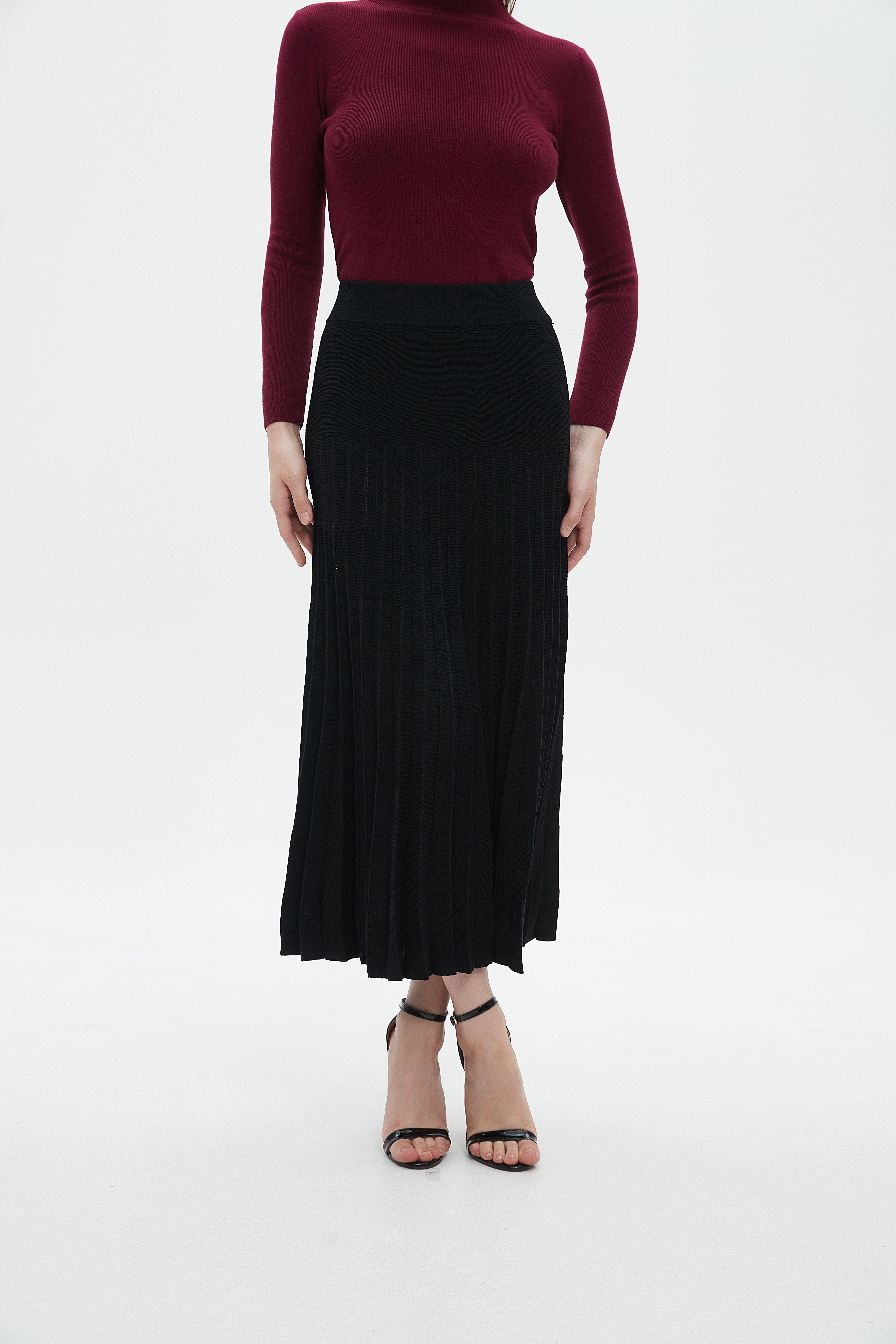 ميكا تنورة نسائي ميدي سادة بكسرات