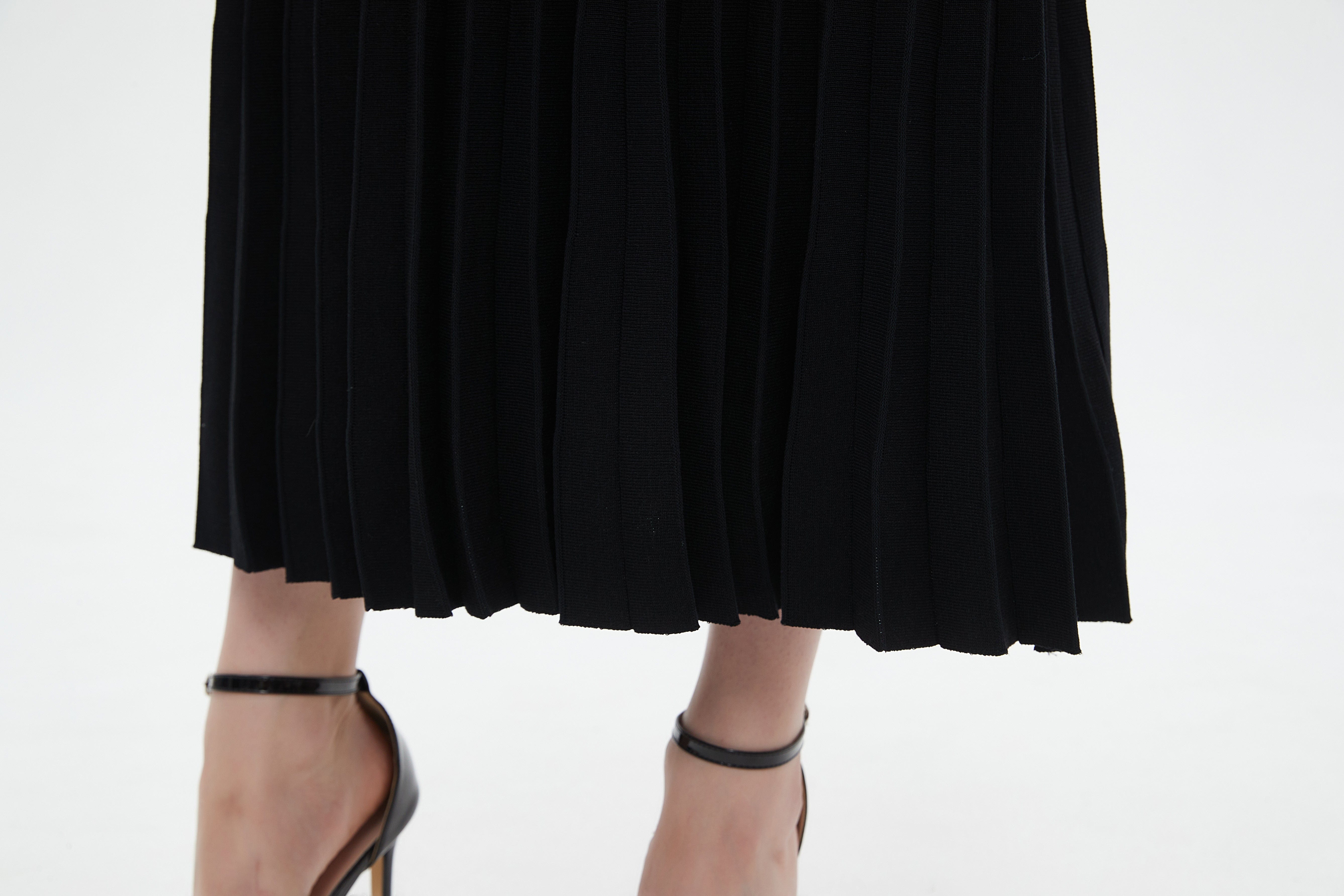 ميكا تنورة نسائي ميدي سادة بكسرات