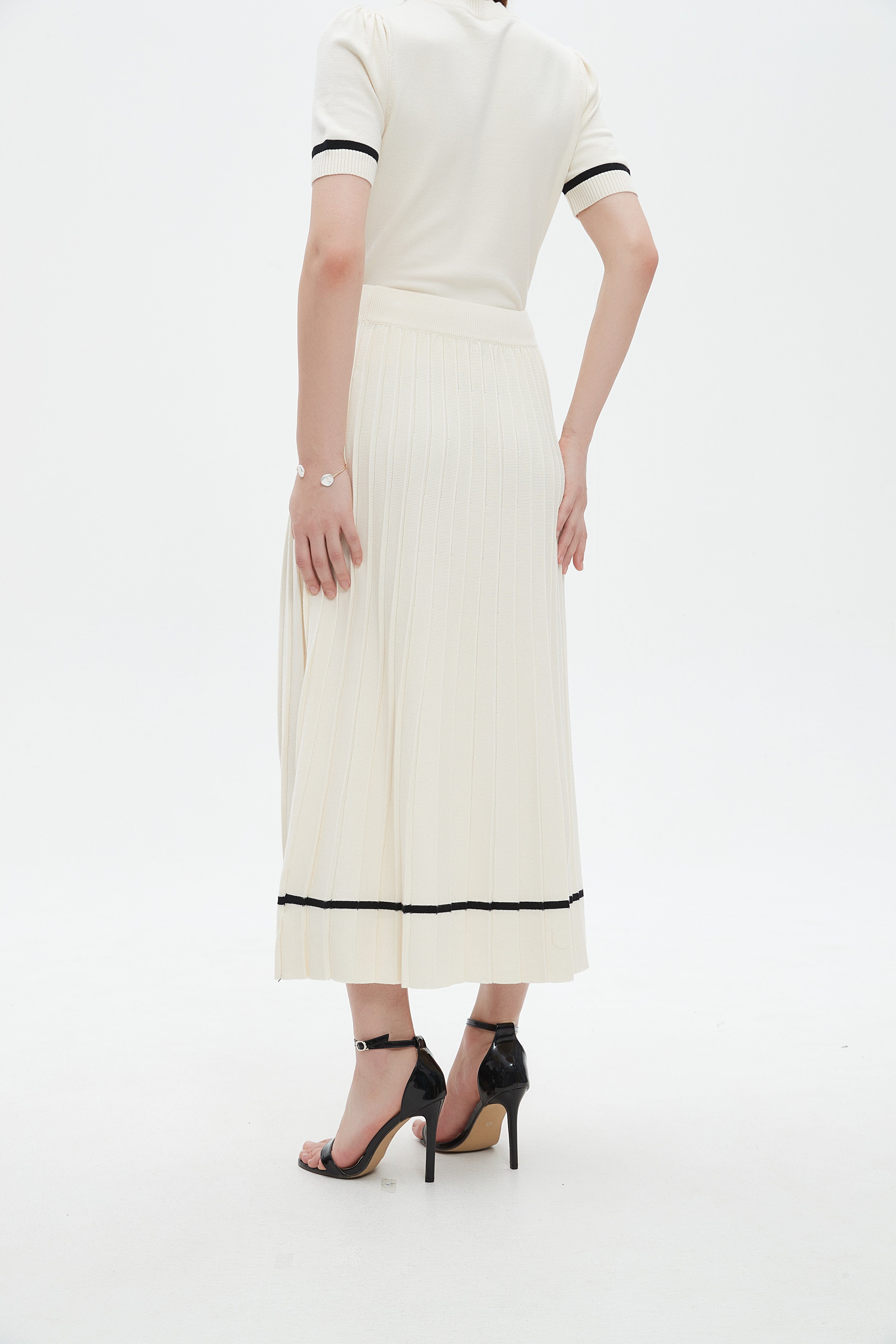 ميكا تنورة ميدي منسوجة بليسية