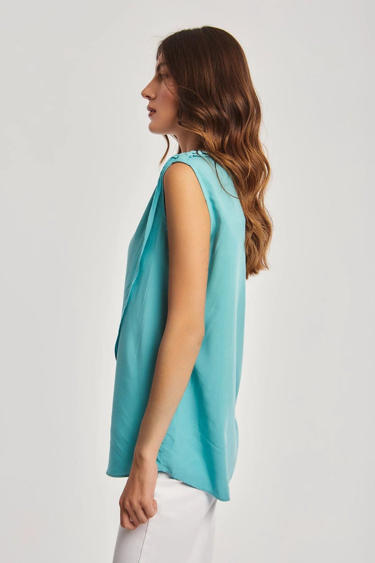 داليدرس بلوزة نسائة سادة بدون أكمام