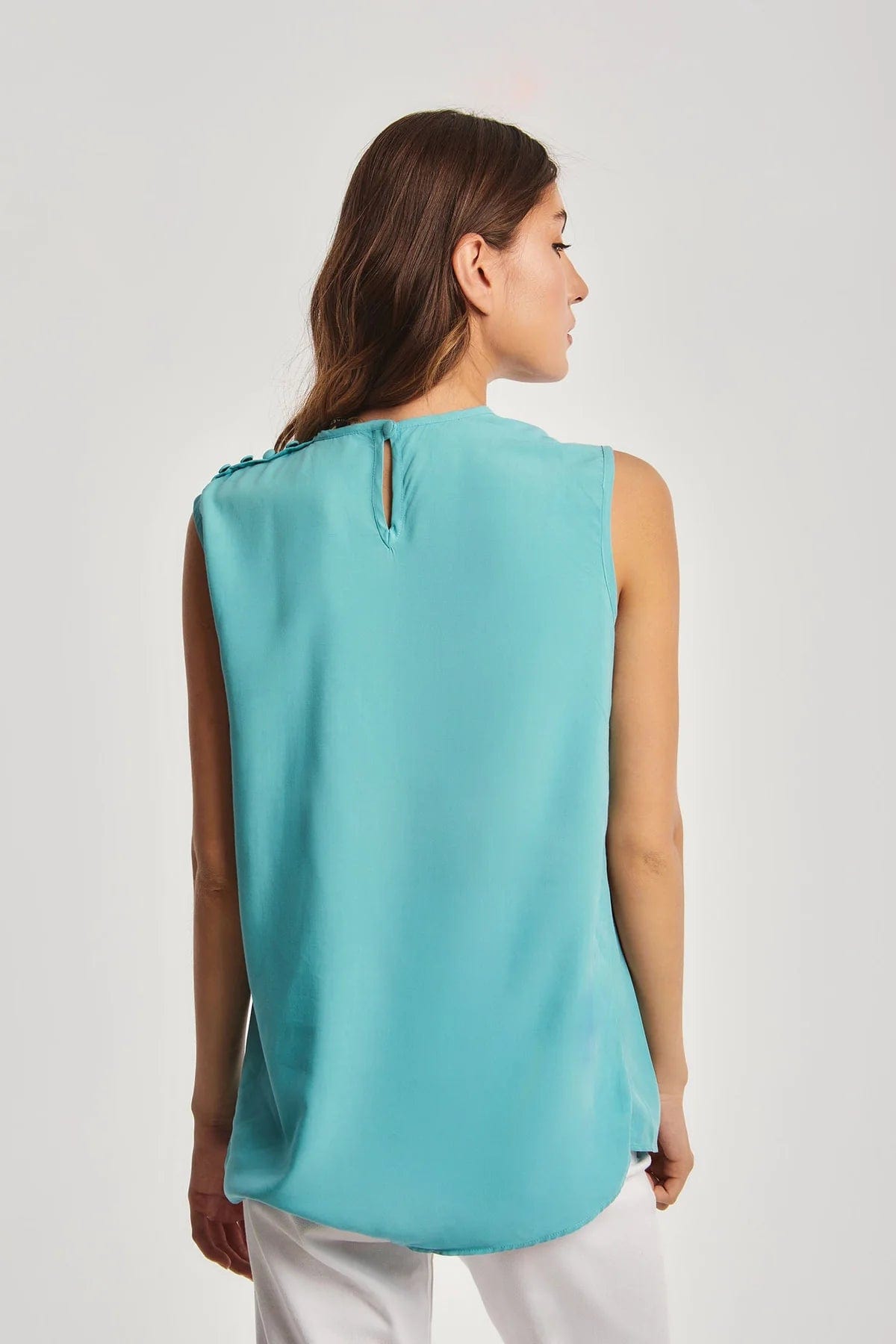 داليدرس بلوزة نسائة سادة بدون أكمام