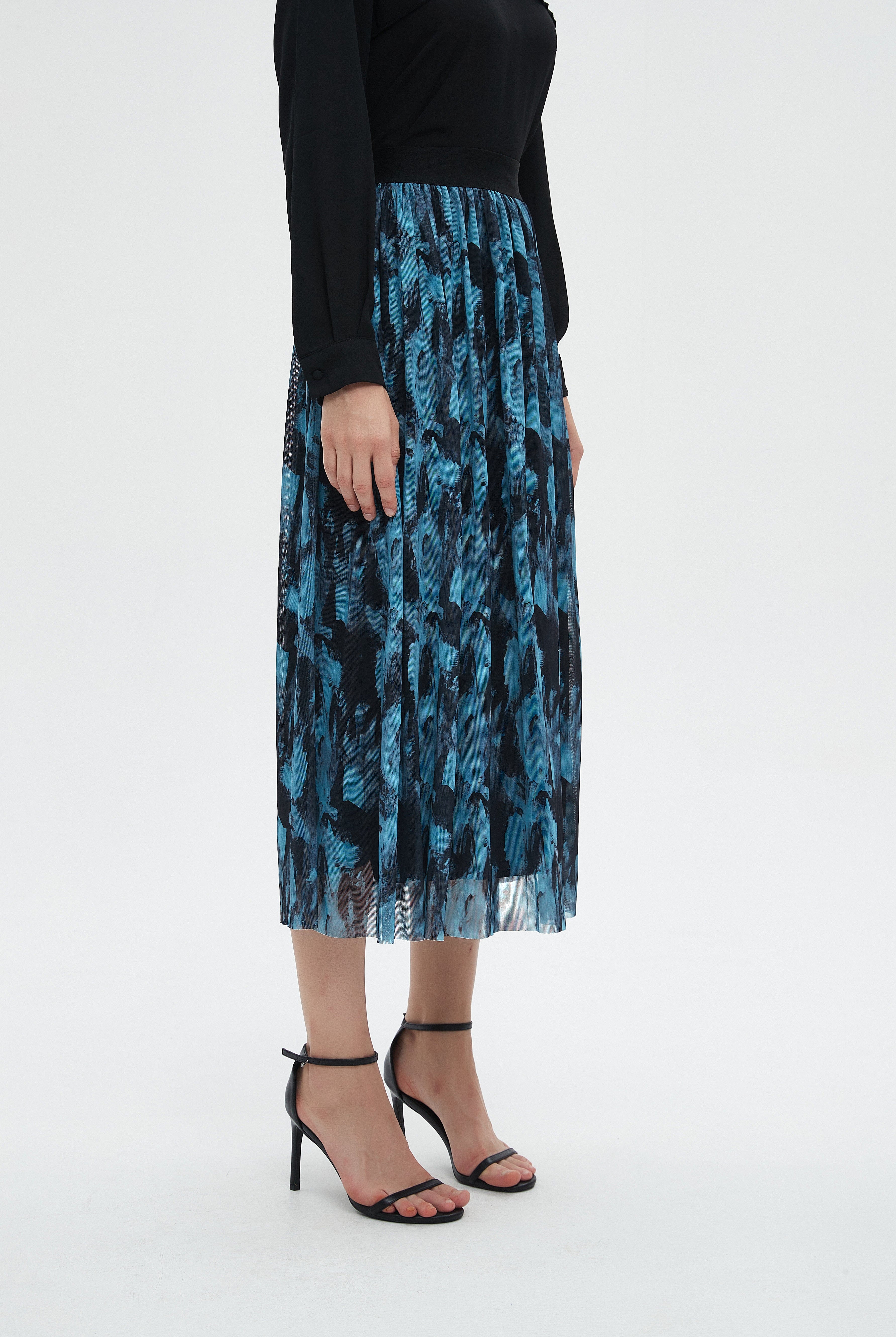 ميكا تنورة نسائية ميدي مشجرة