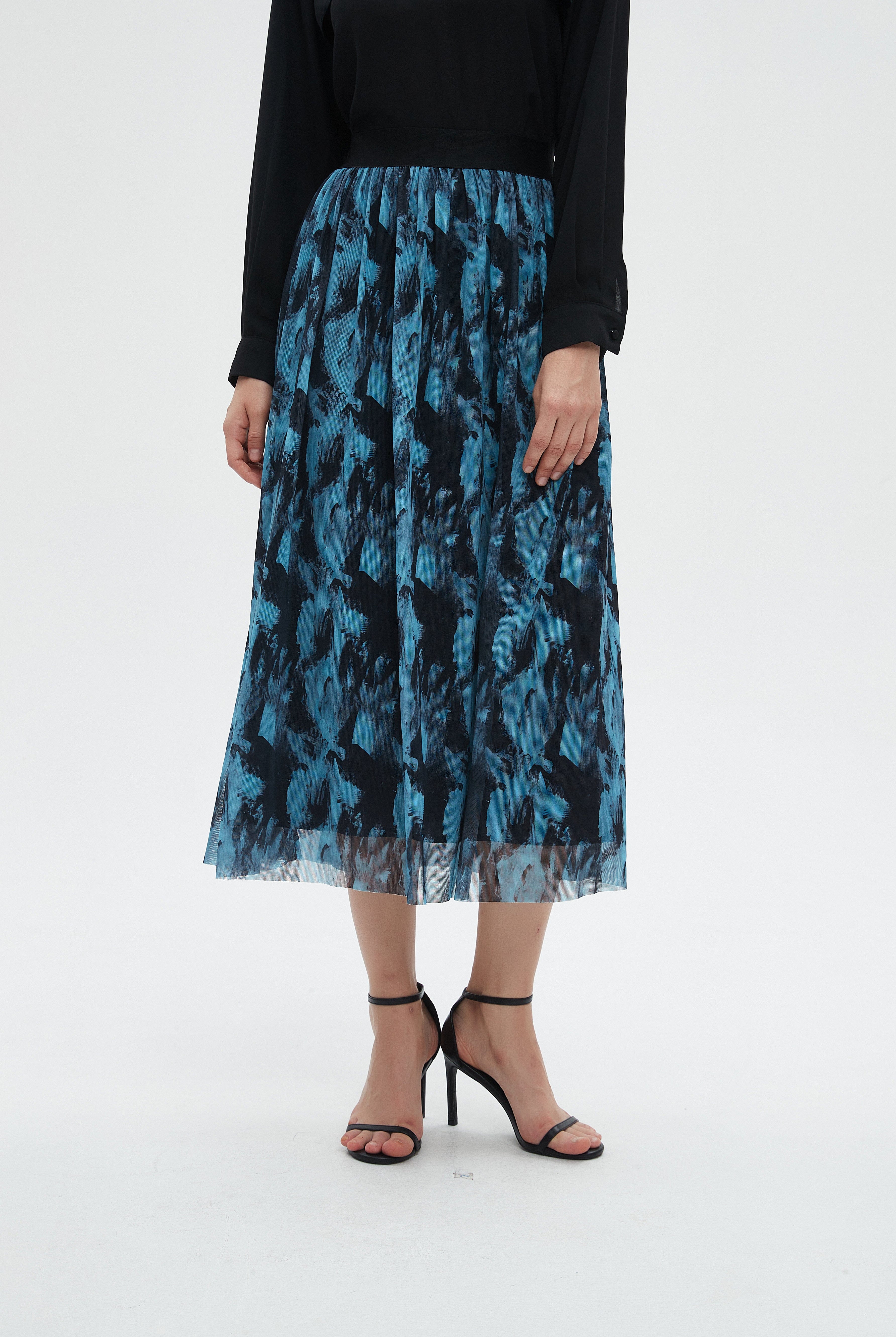 ميكا تنورة نسائية ميدي مشجرة