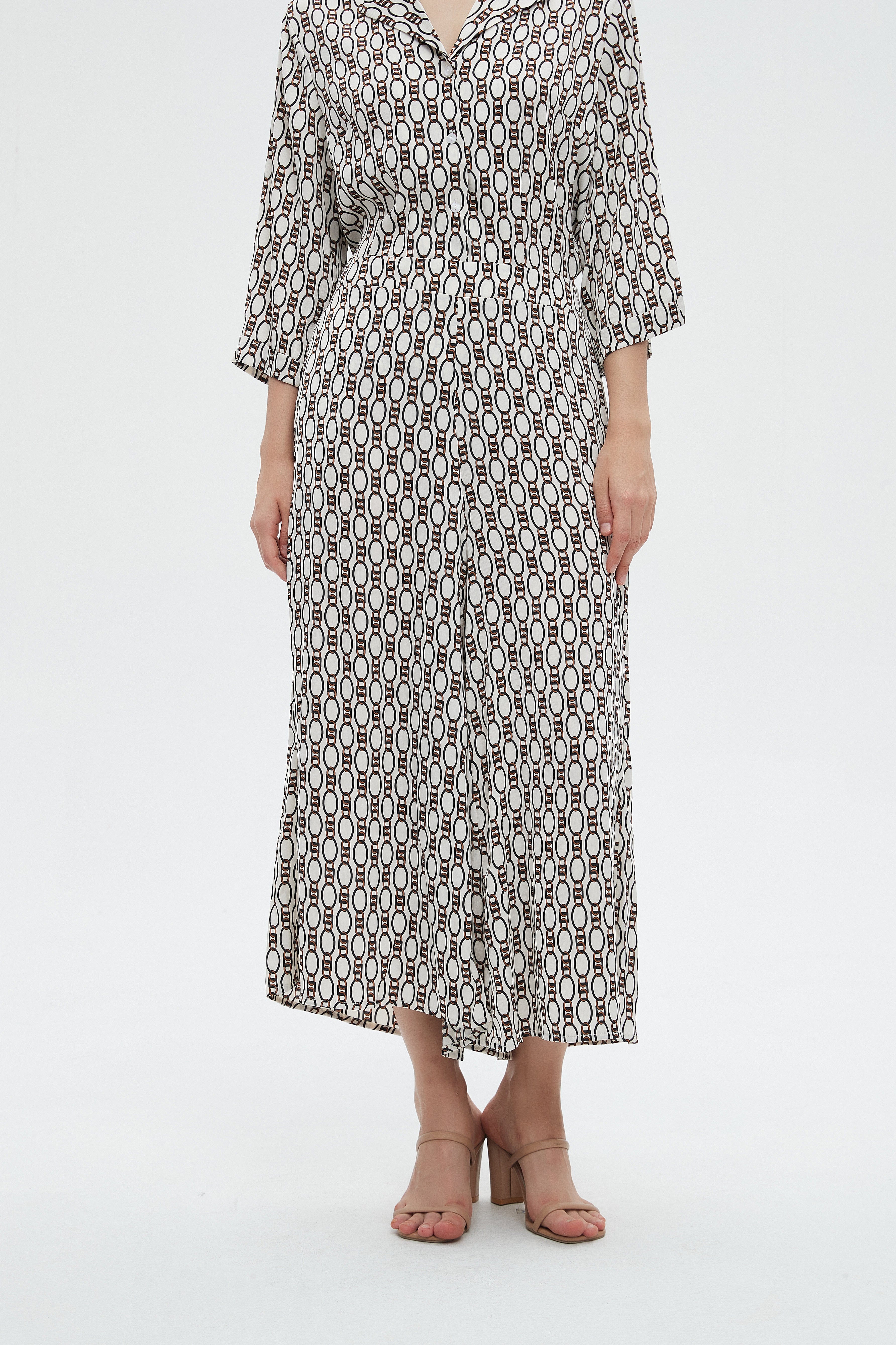 ميكا بنطلون نسائي 3/4 برجل منقوشة واسعة