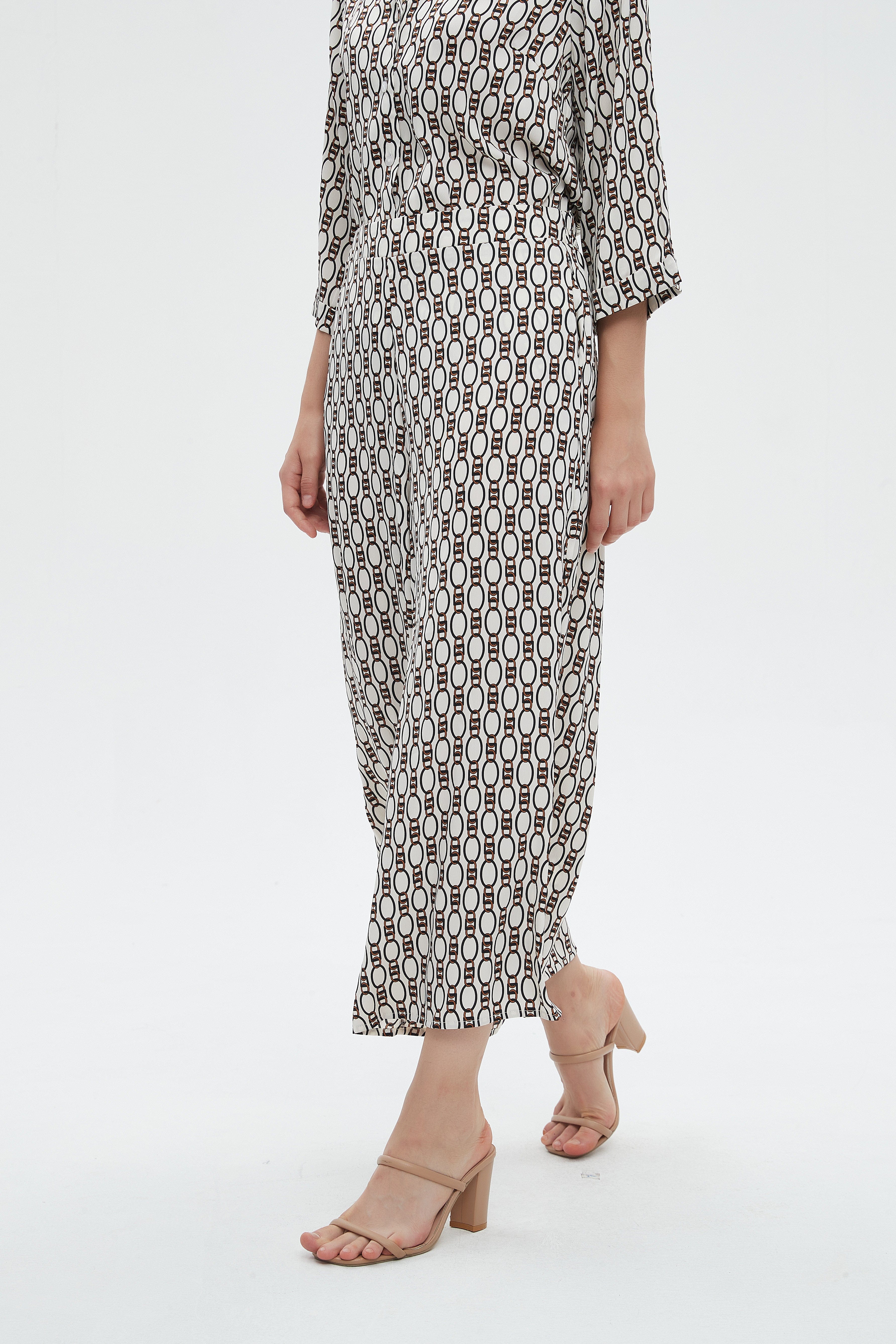 ميكا بنطلون نسائي 3/4 برجل منقوشة واسعة