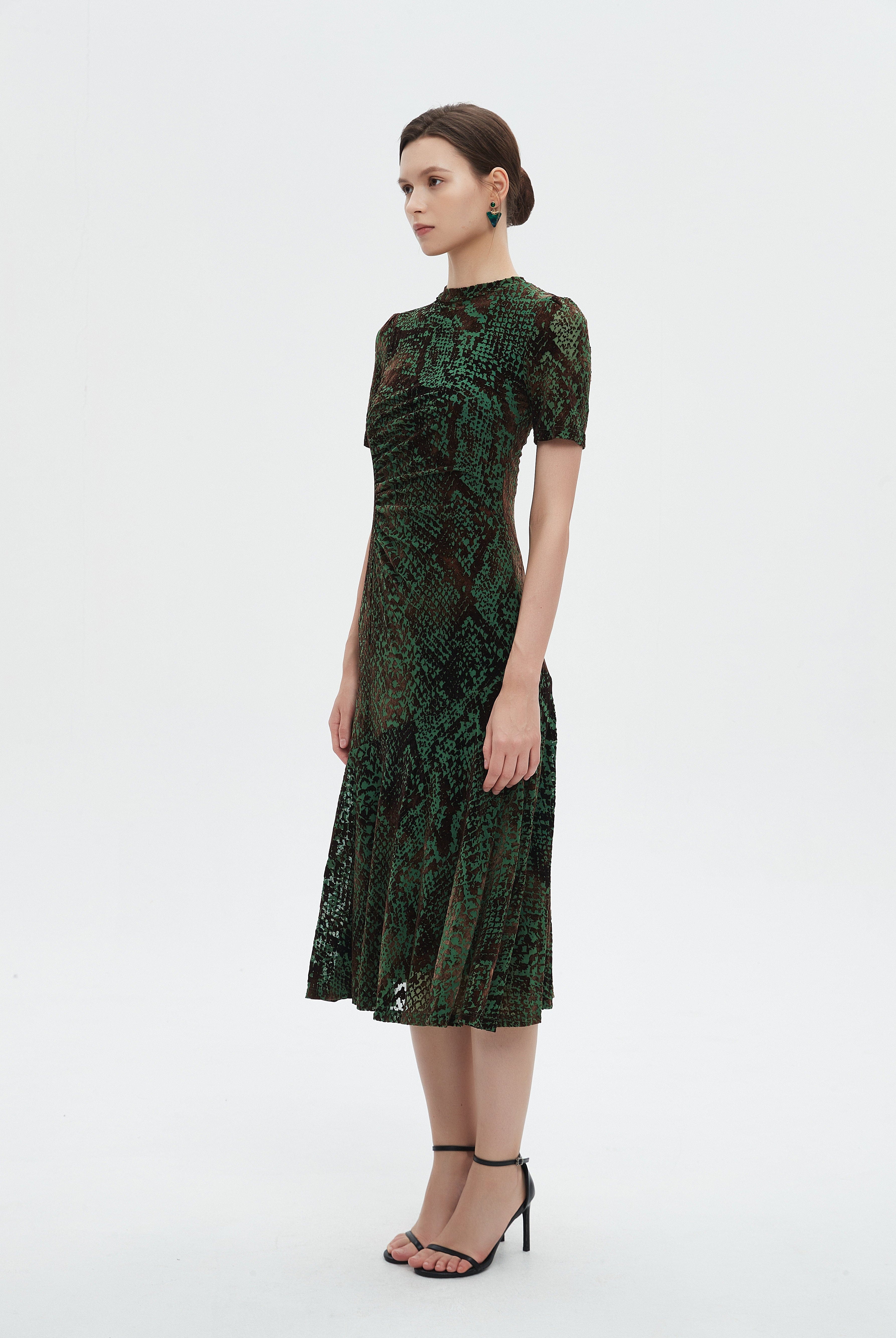 ميكا فستان نسائي ميدي نص كم منثوش