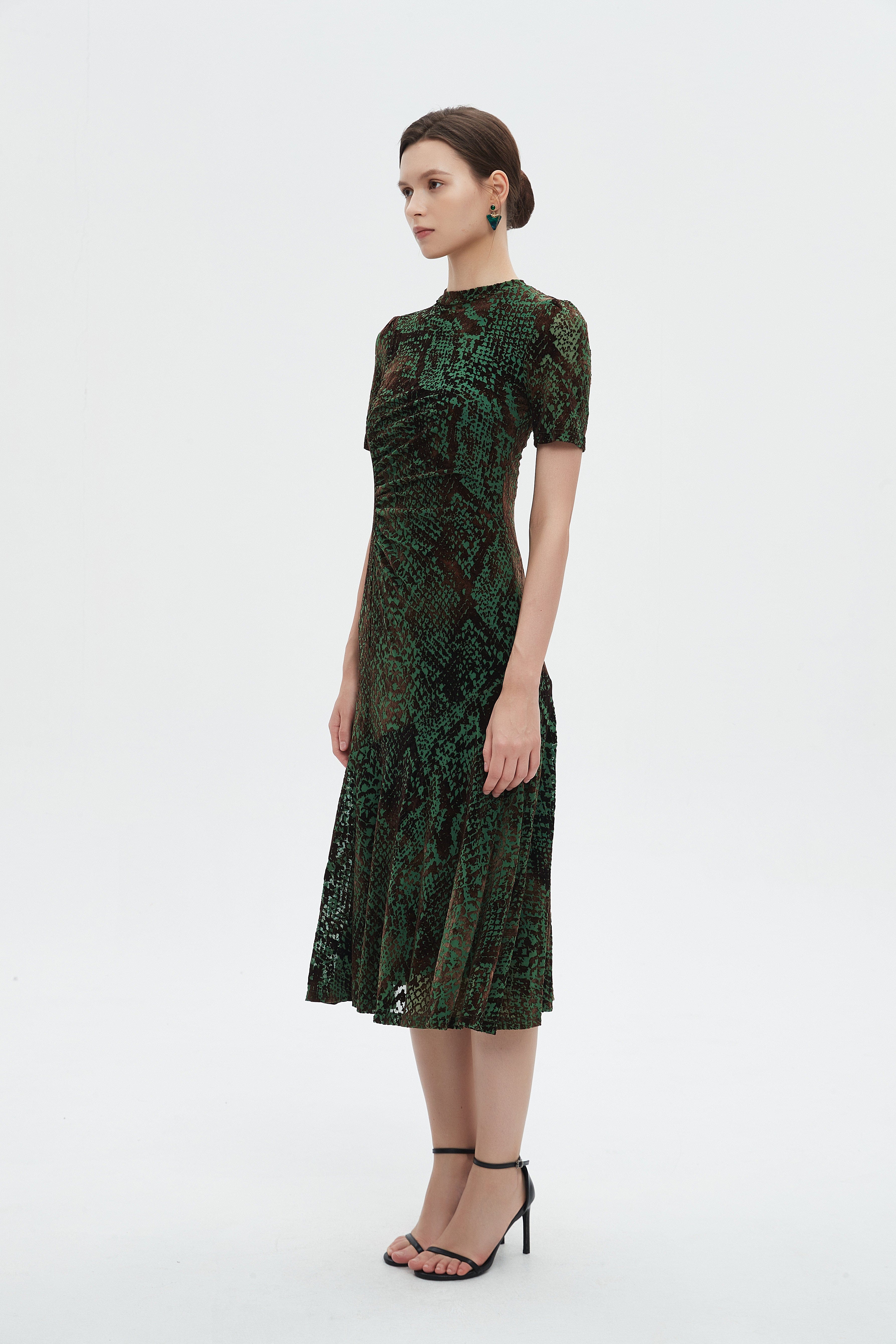 ميكا فستان نسائي ميدي نص كم منثوش