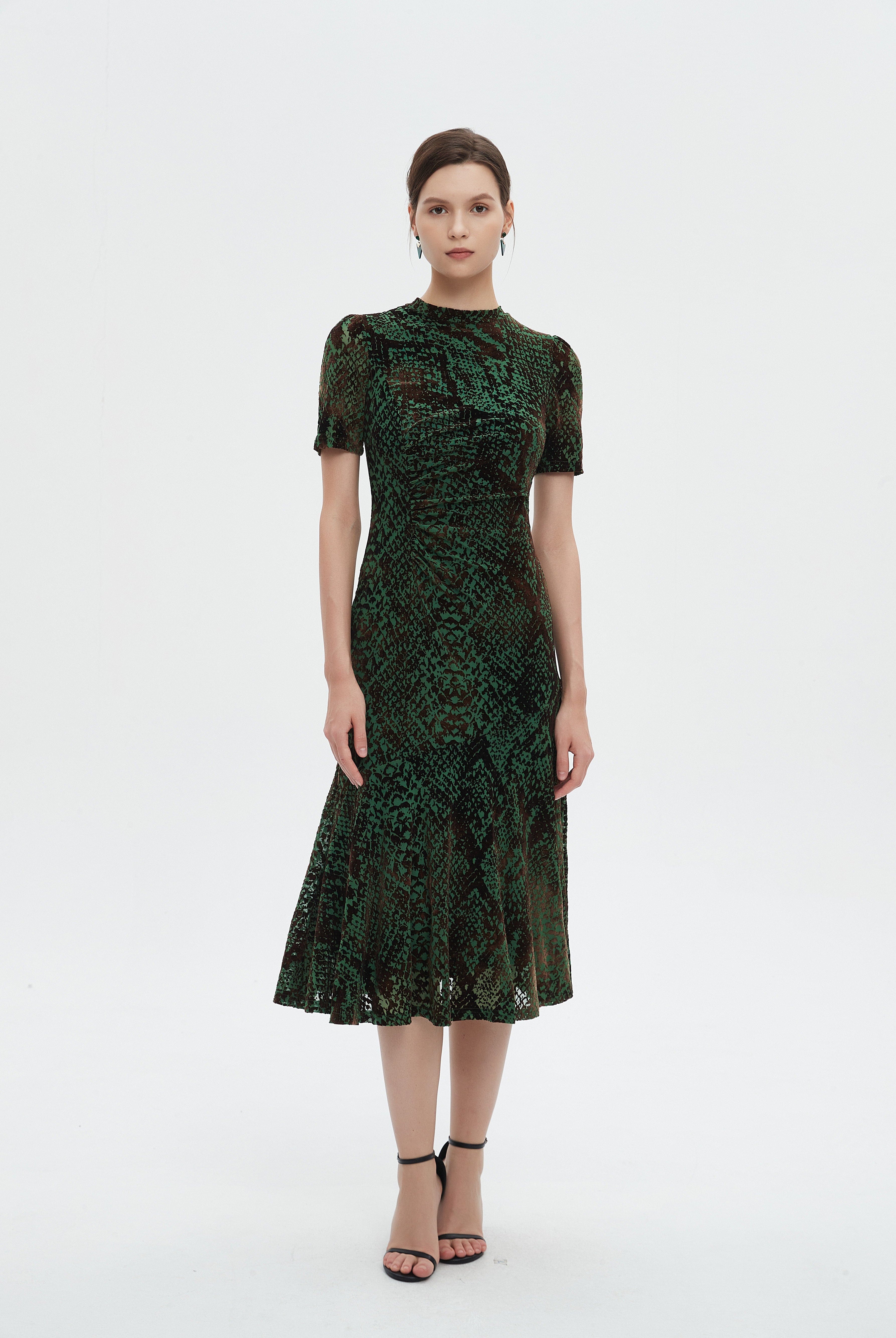 ميكا فستان نسائي ميدي نص كم منثوش