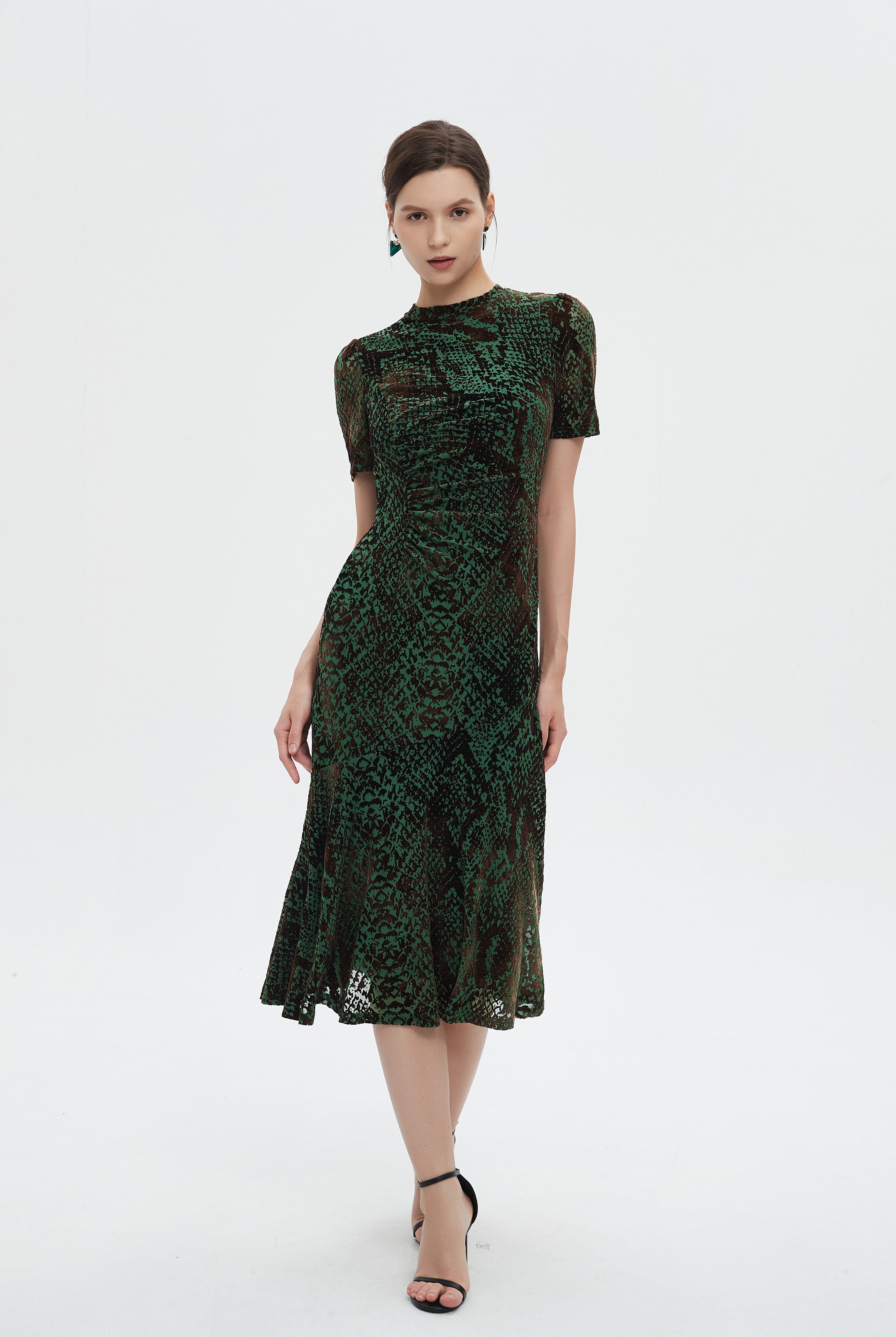 ميكا فستان نسائي ميدي نص كم منثوش