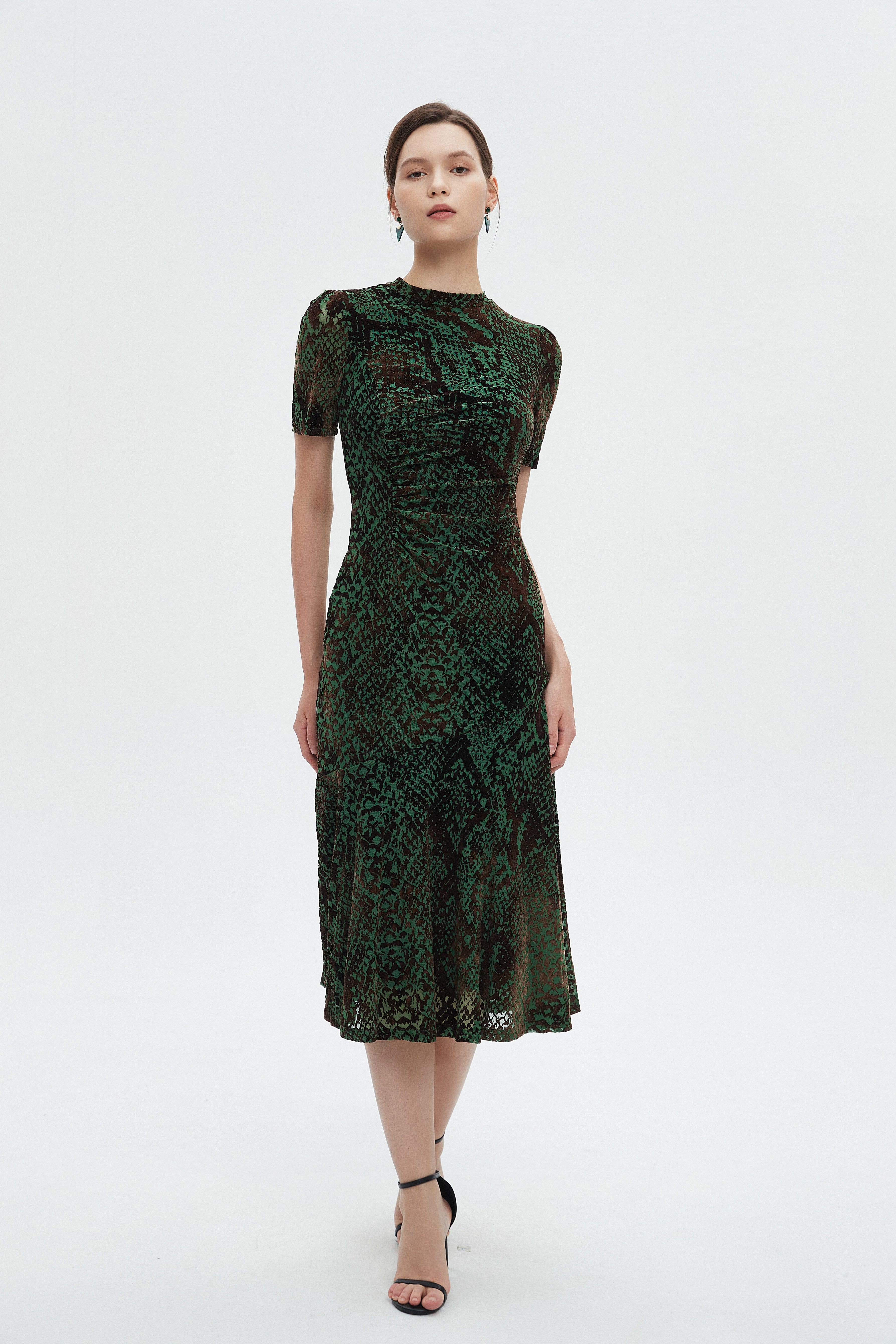 ميكا فستان نسائي ميدي نص كم منثوش