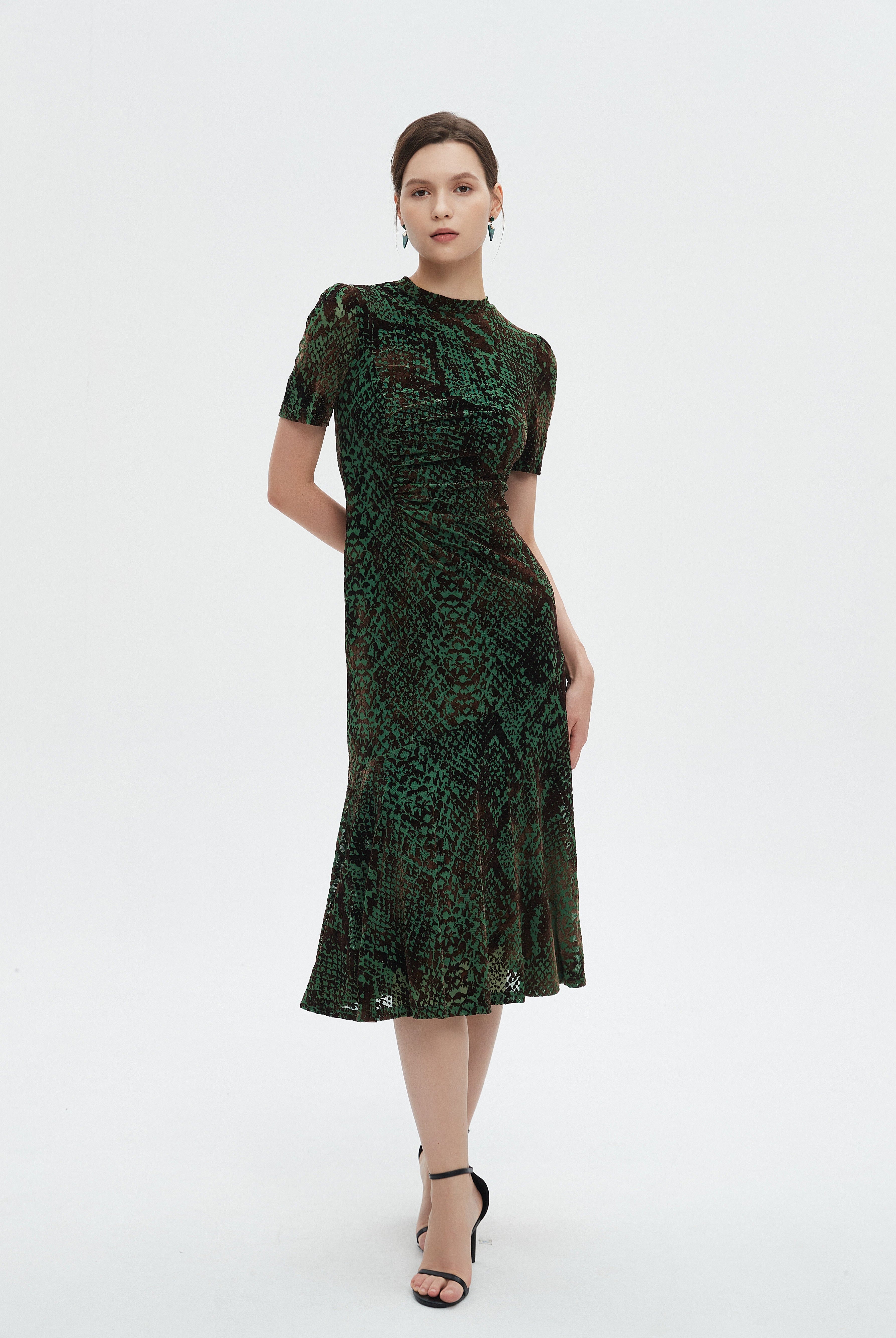 ميكا فستان نسائي ميدي نص كم منثوش