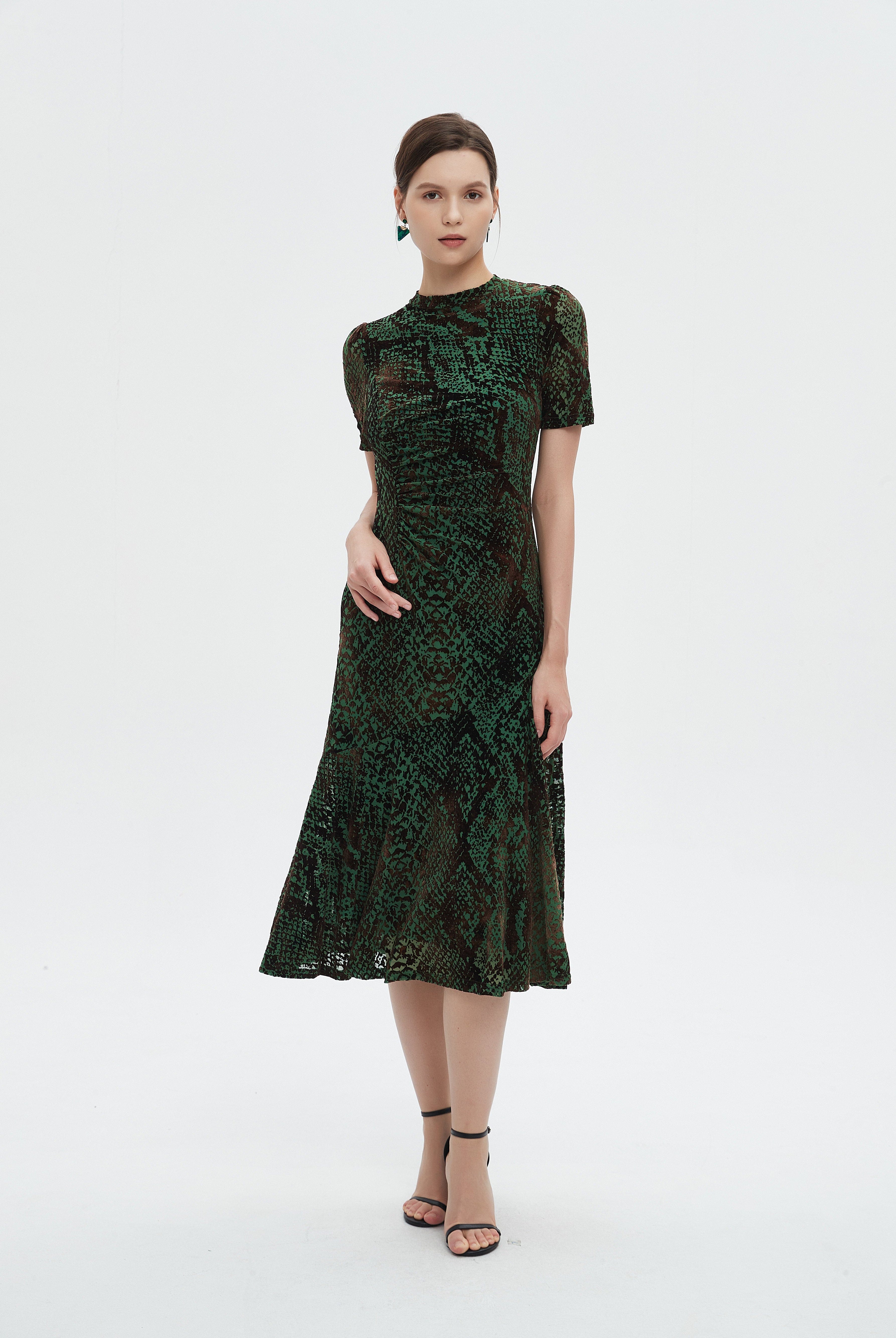 ميكا فستان نسائي ميدي نص كم منثوش