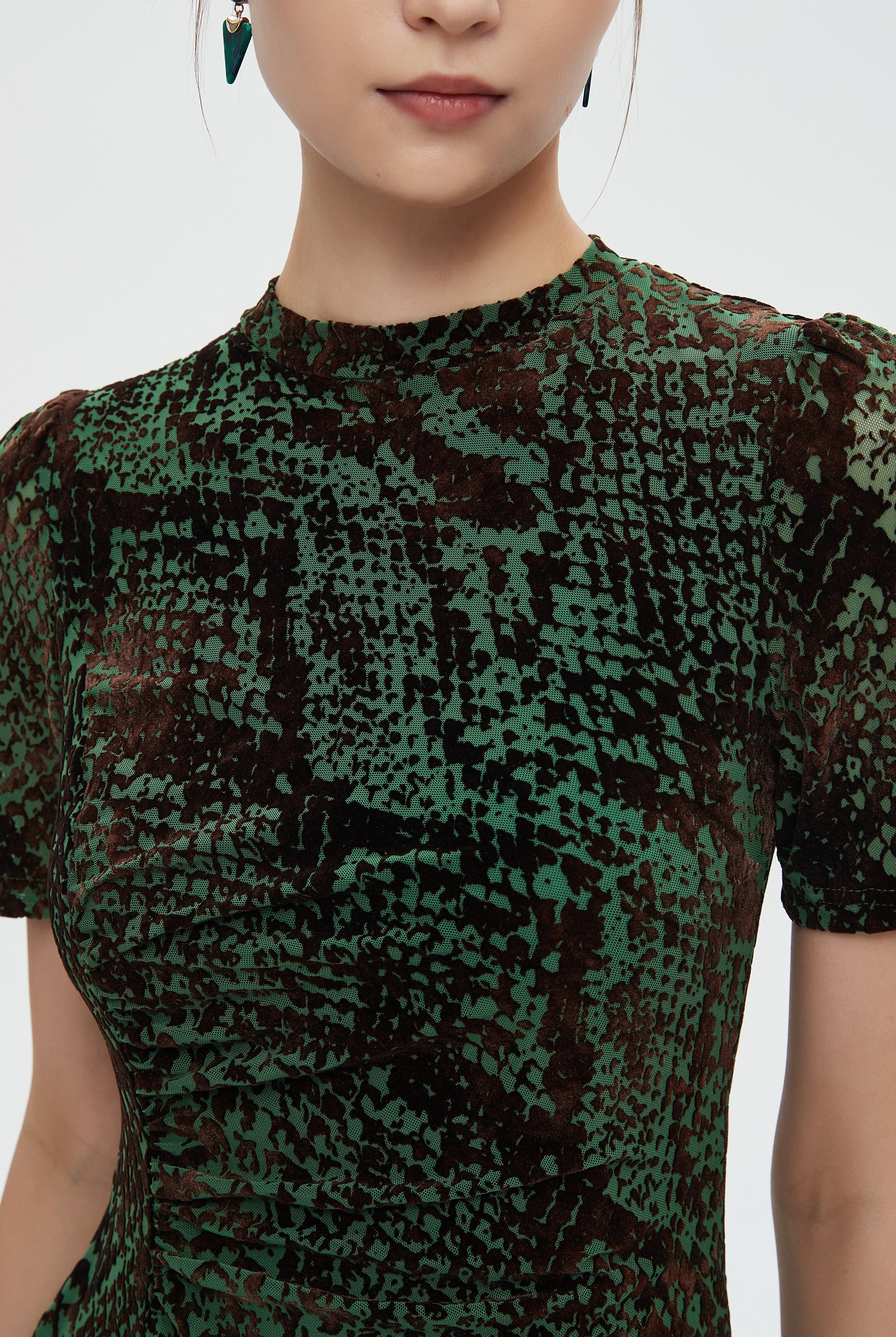 ميكا فستان نسائي ميدي نص كم منثوش