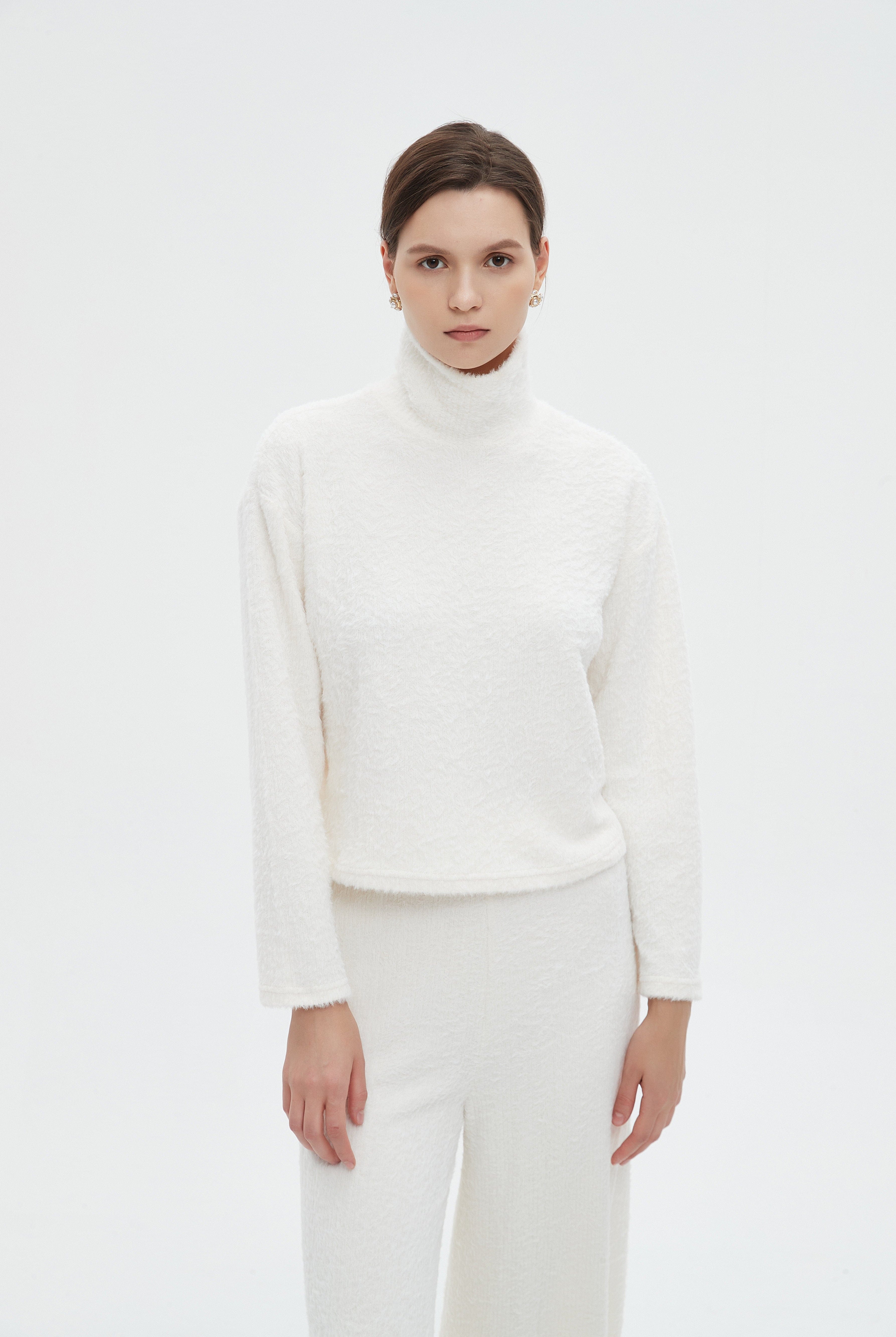 ميكا بلوزة نسائية سادة شتوي باكمام طويلة ورقبة عالية