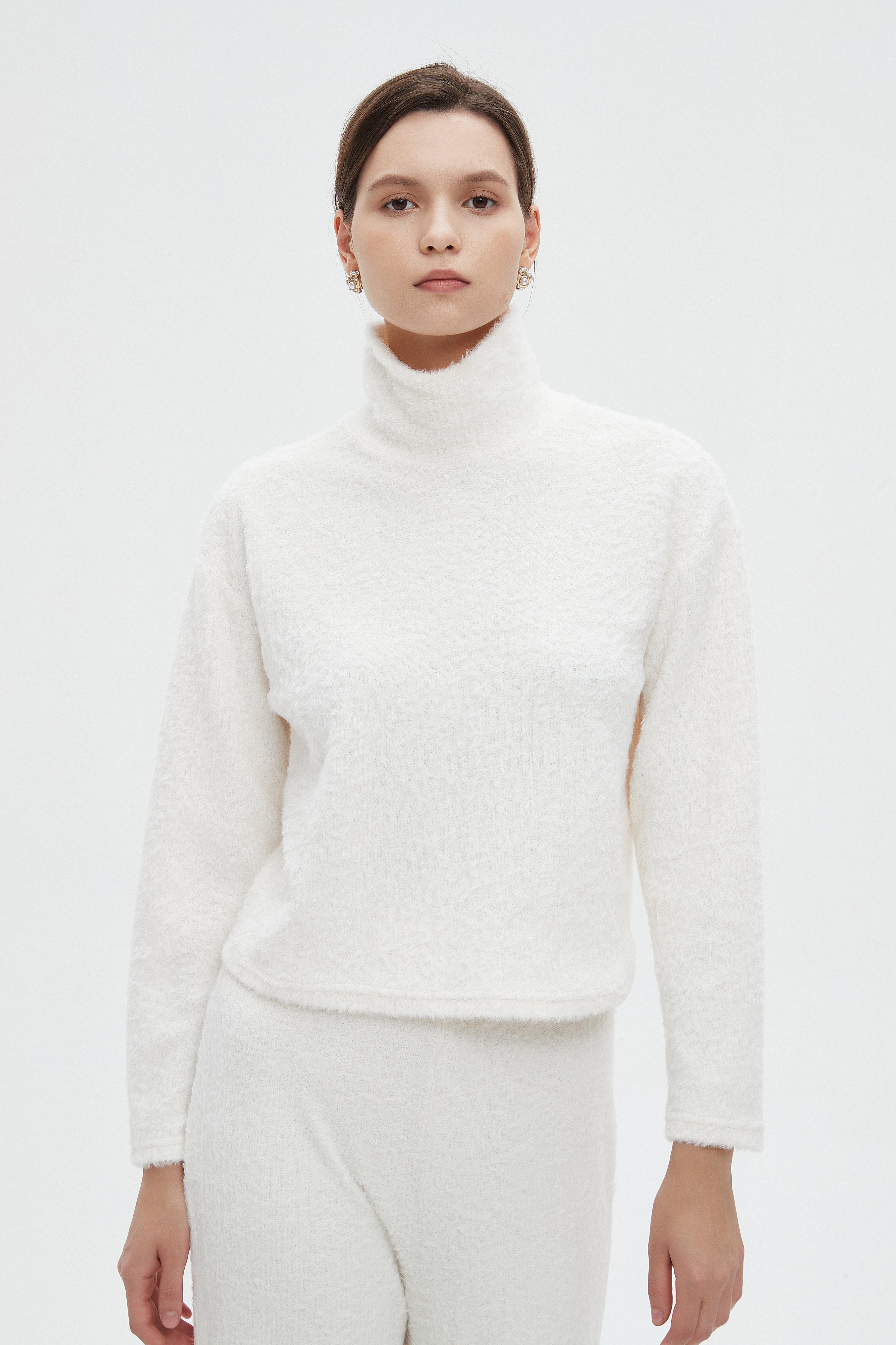 ميكا بلوزة نسائية سادة شتوي باكمام طويلة ورقبة عالية